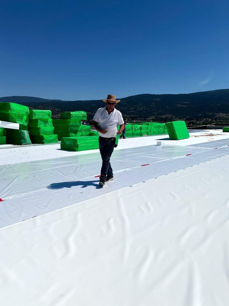 Commercial Roofing Installation using Durolast by Top Notch Roofing Inc