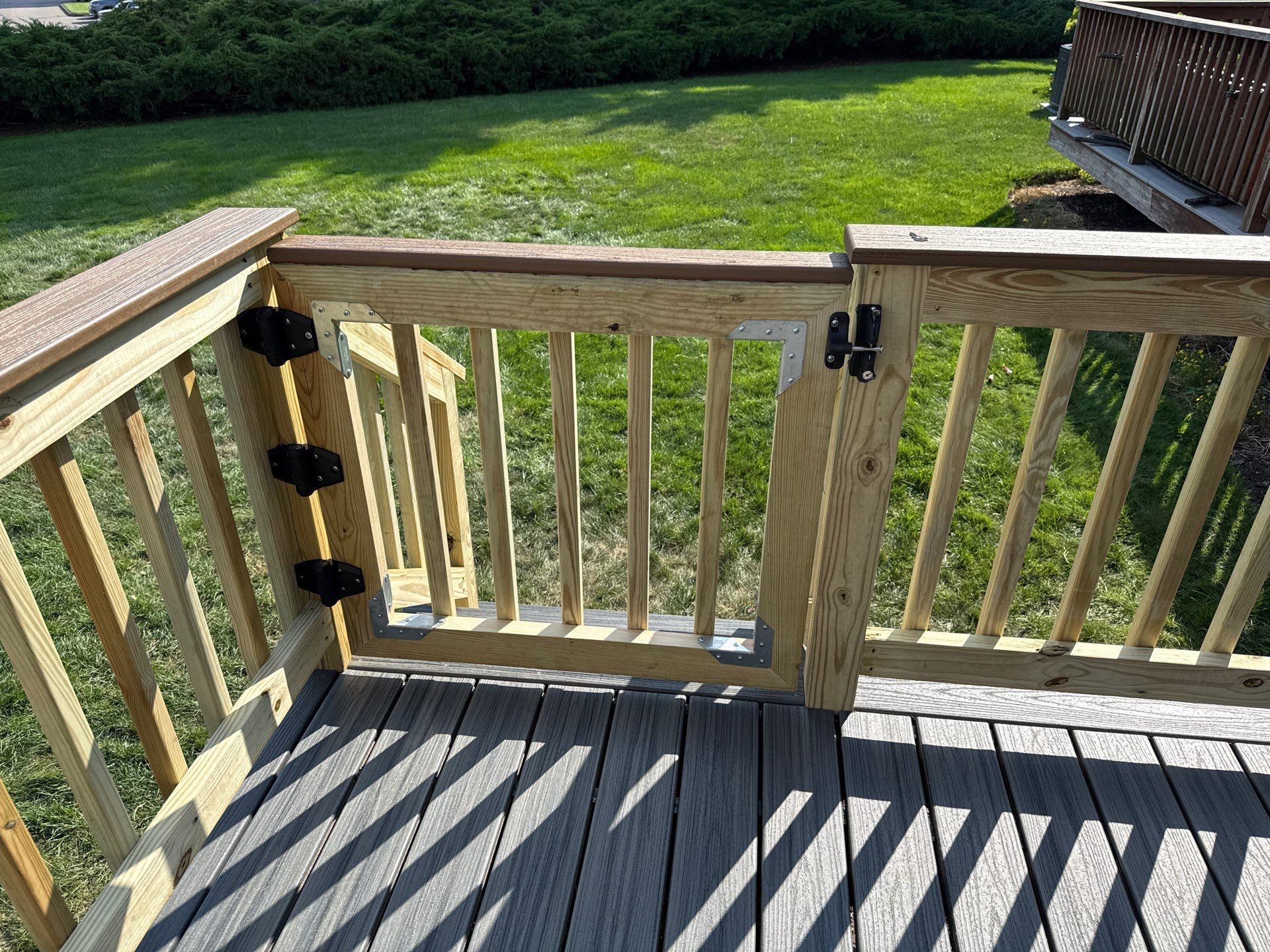 Deck replacement using trex Tropical Island mist and Pressure treated railings. by DiGiorgi Roofing and Siding Inc