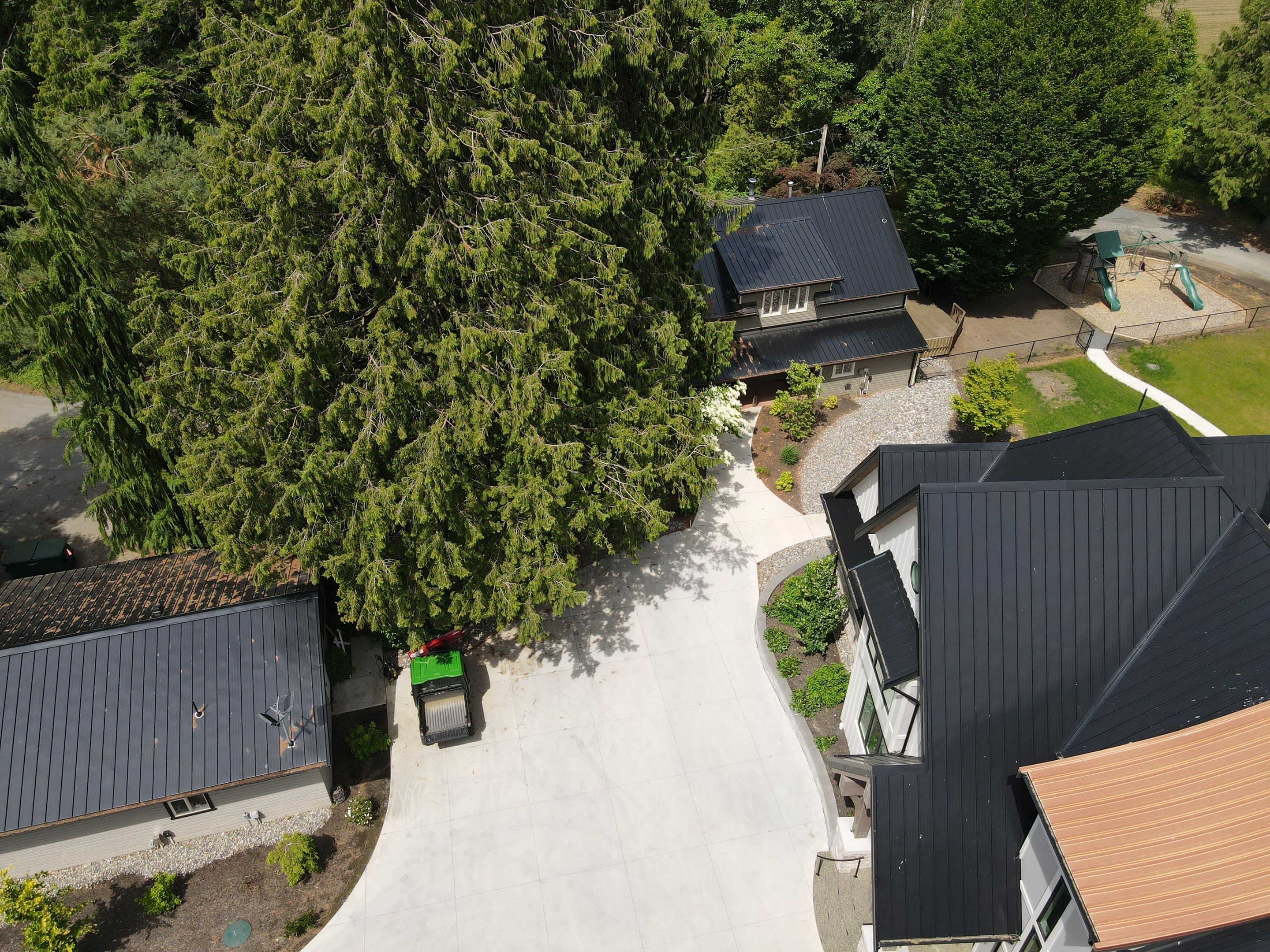 Commercial Roofing Installation using 12" Prolok metal  by Top Notch Roofing Inc