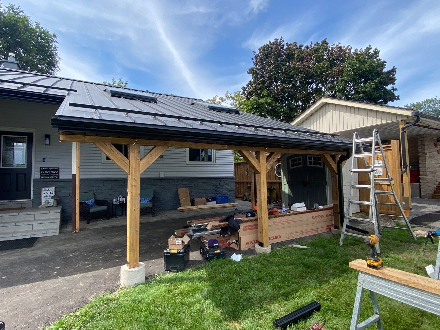 Residential Roofing Installation using 16" Standing Seam Panels by Jay Carter Roofing & Sheet Metal