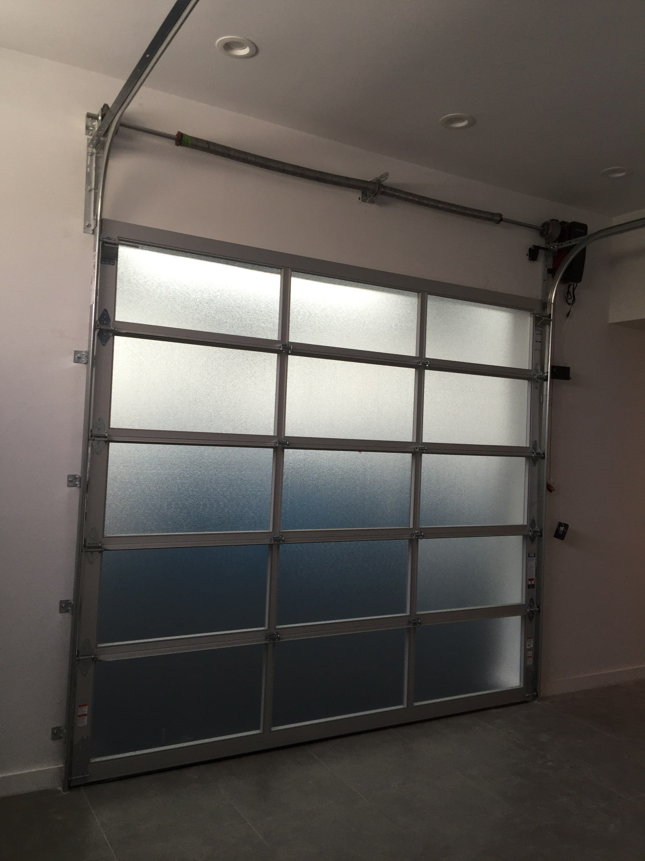 Clopay Avante, Aluminum and Glass Garage Door in Fort Lauderdale by The Door Doctor of South Florida, Inc.