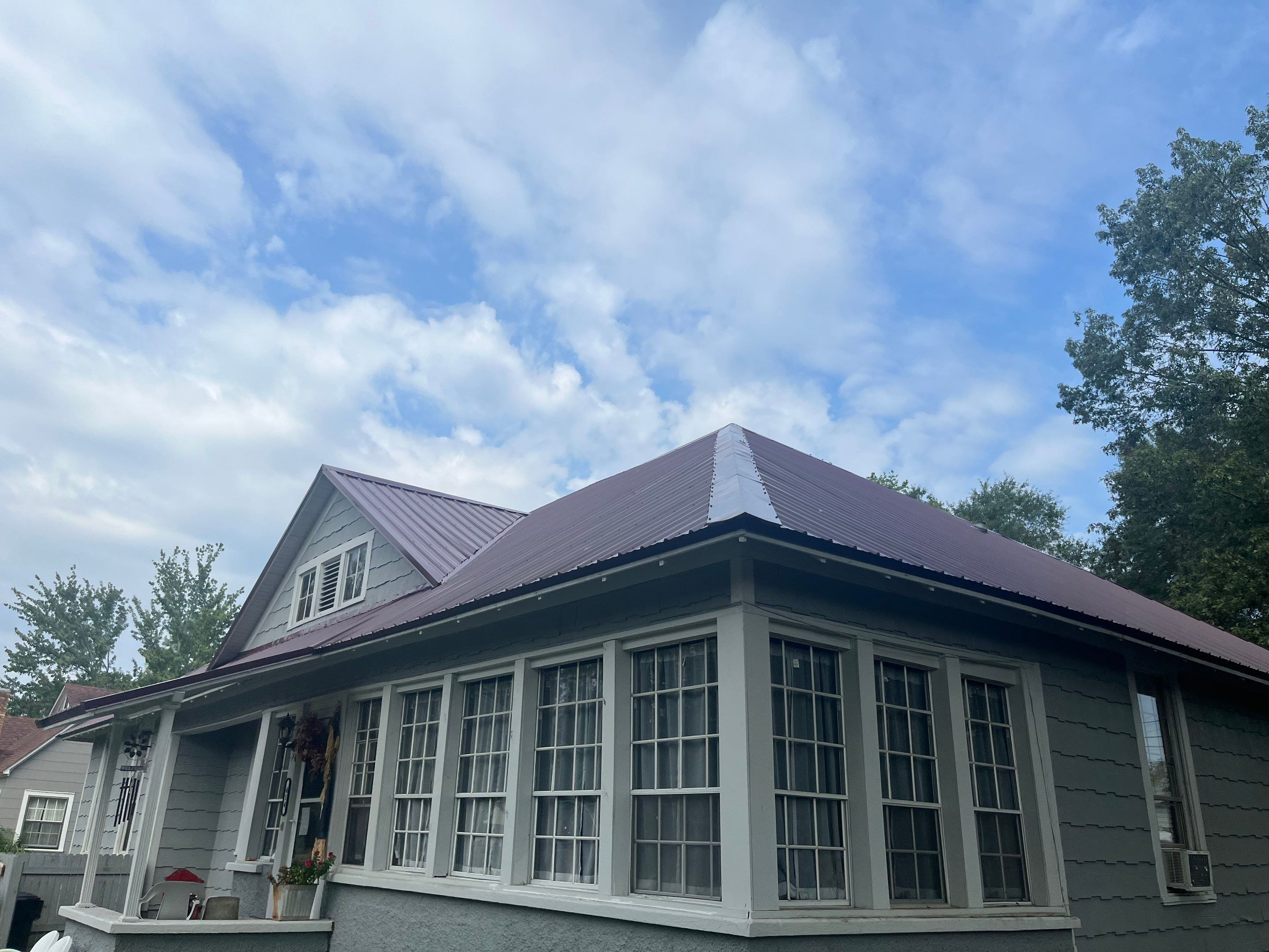 Residential Metal Roof Replacement using Reed's Metals: Colored Residental Panel (Burgundy) by Hostetler Roofing