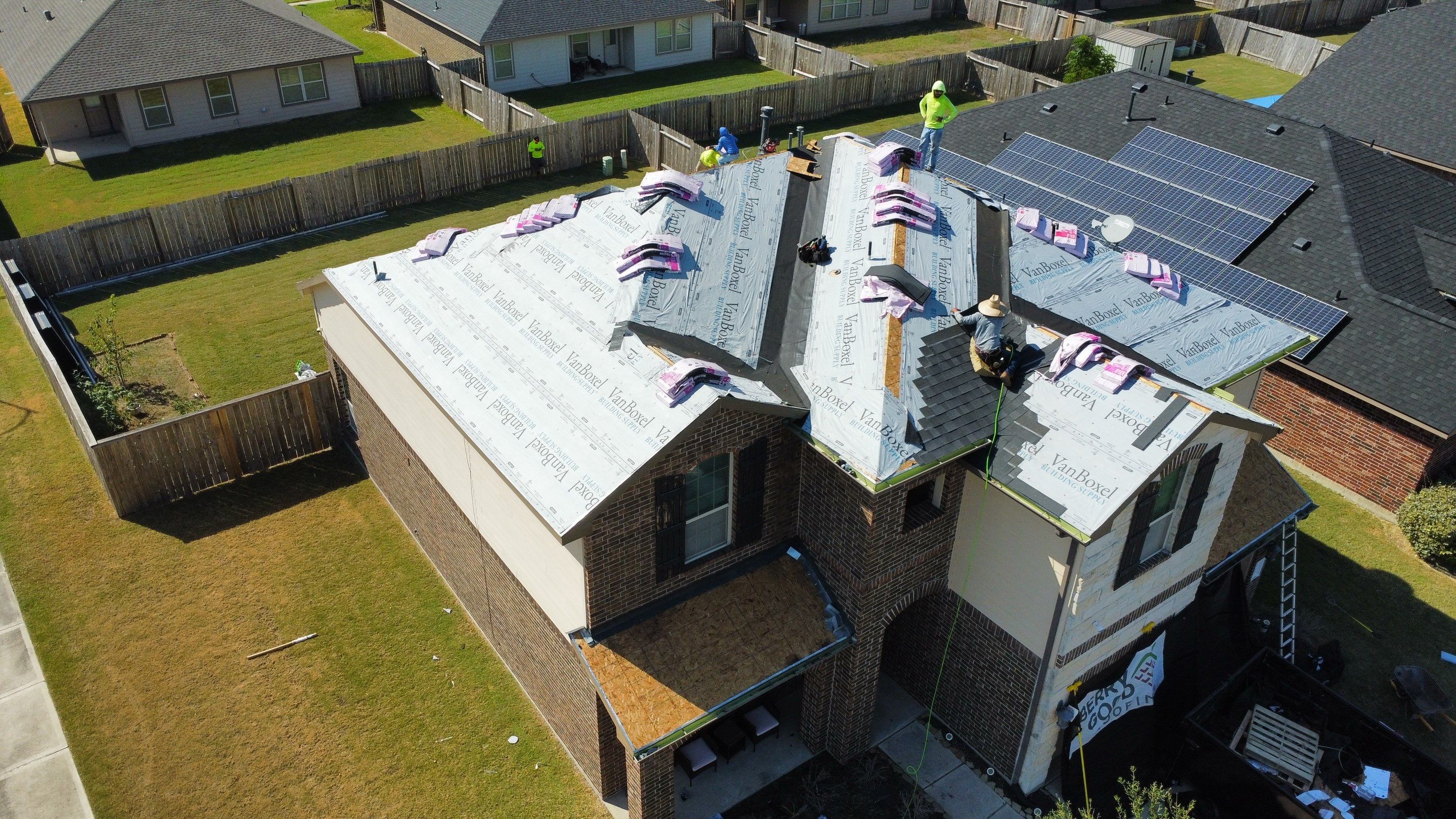 Reroof with Solar panel Detach and Reset by Berry Good Roofing 