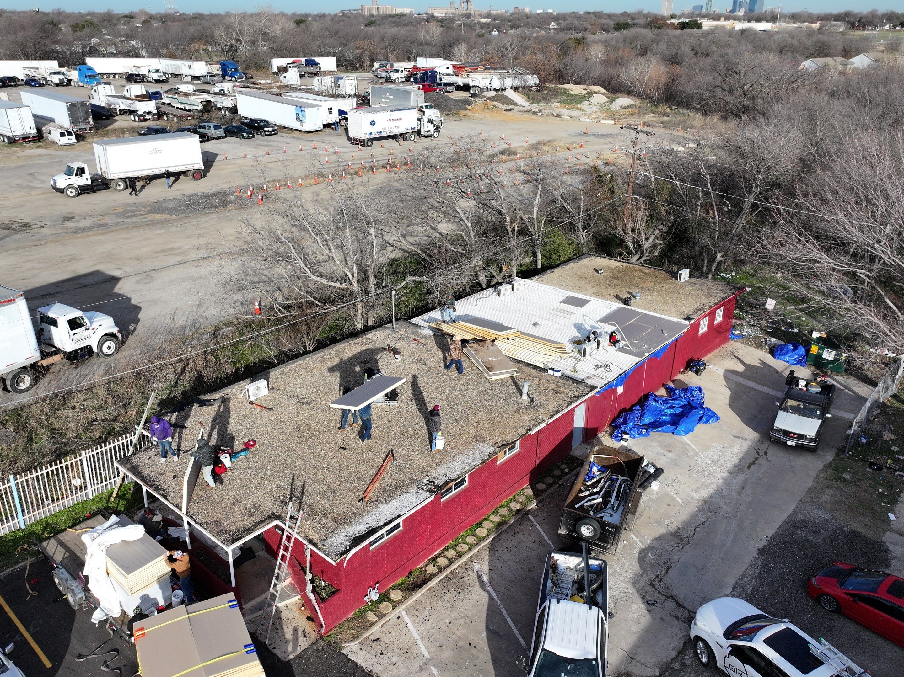 Commercial roofing overlay using GAF TPO over an old ballast roof by Becker Roofing and Exteriors