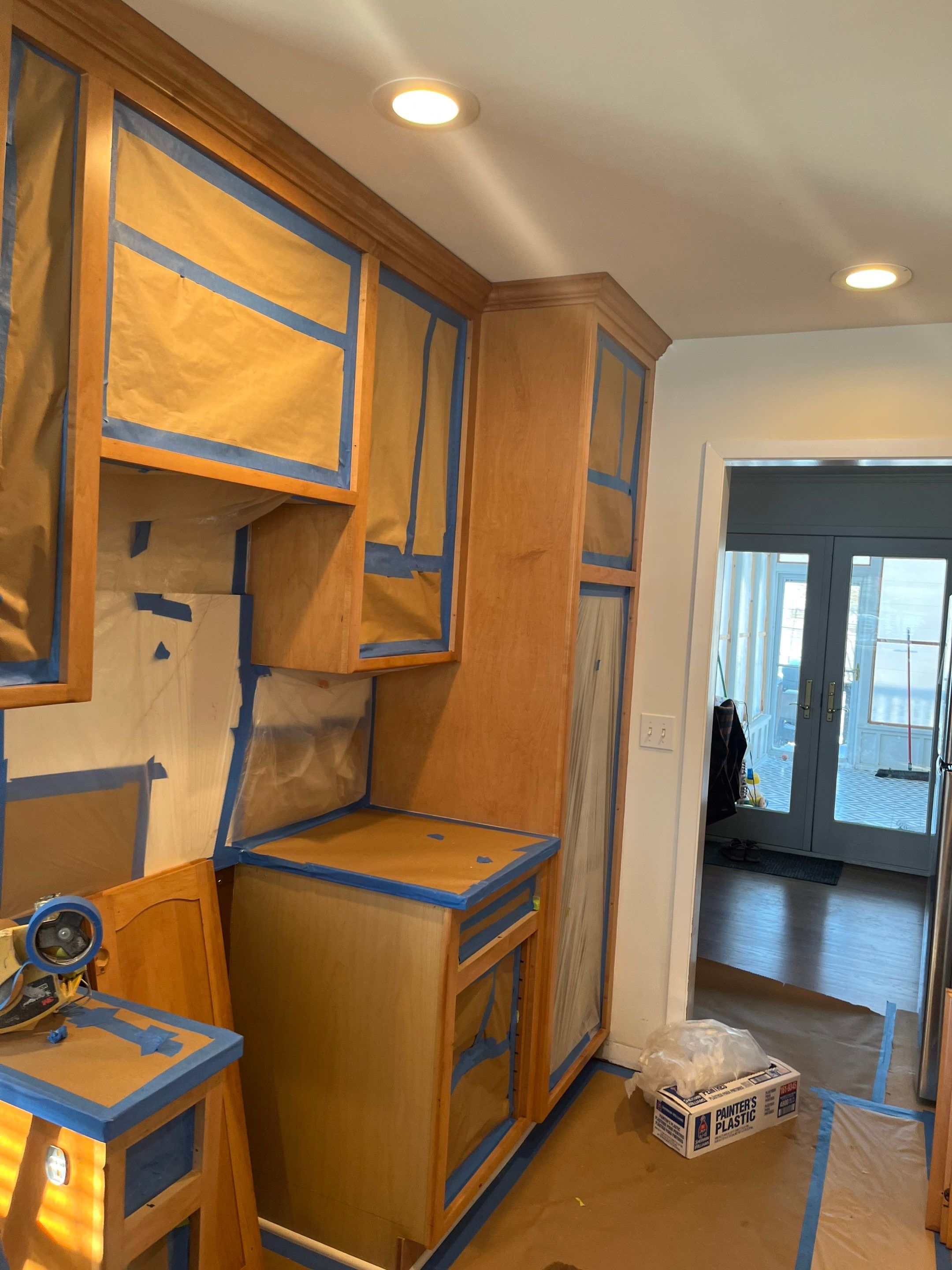 Elegant Transformation: Stained Cabinets Revamped with Sherwin-Williams Juniper by Cougar Painting