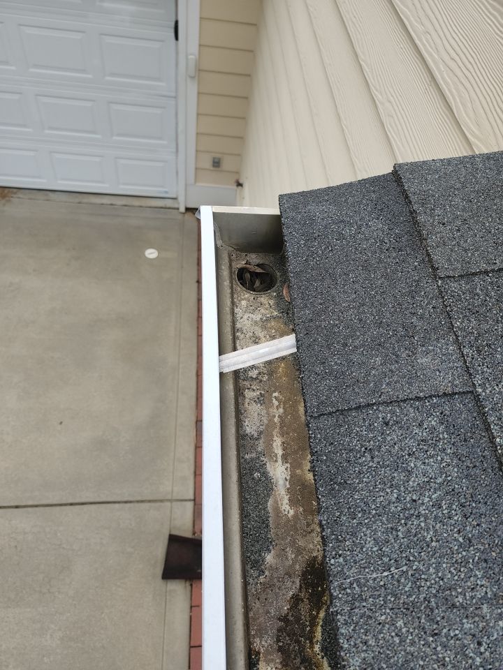 Gutter Cleaning using cleaner by Power Wash Masters LLC