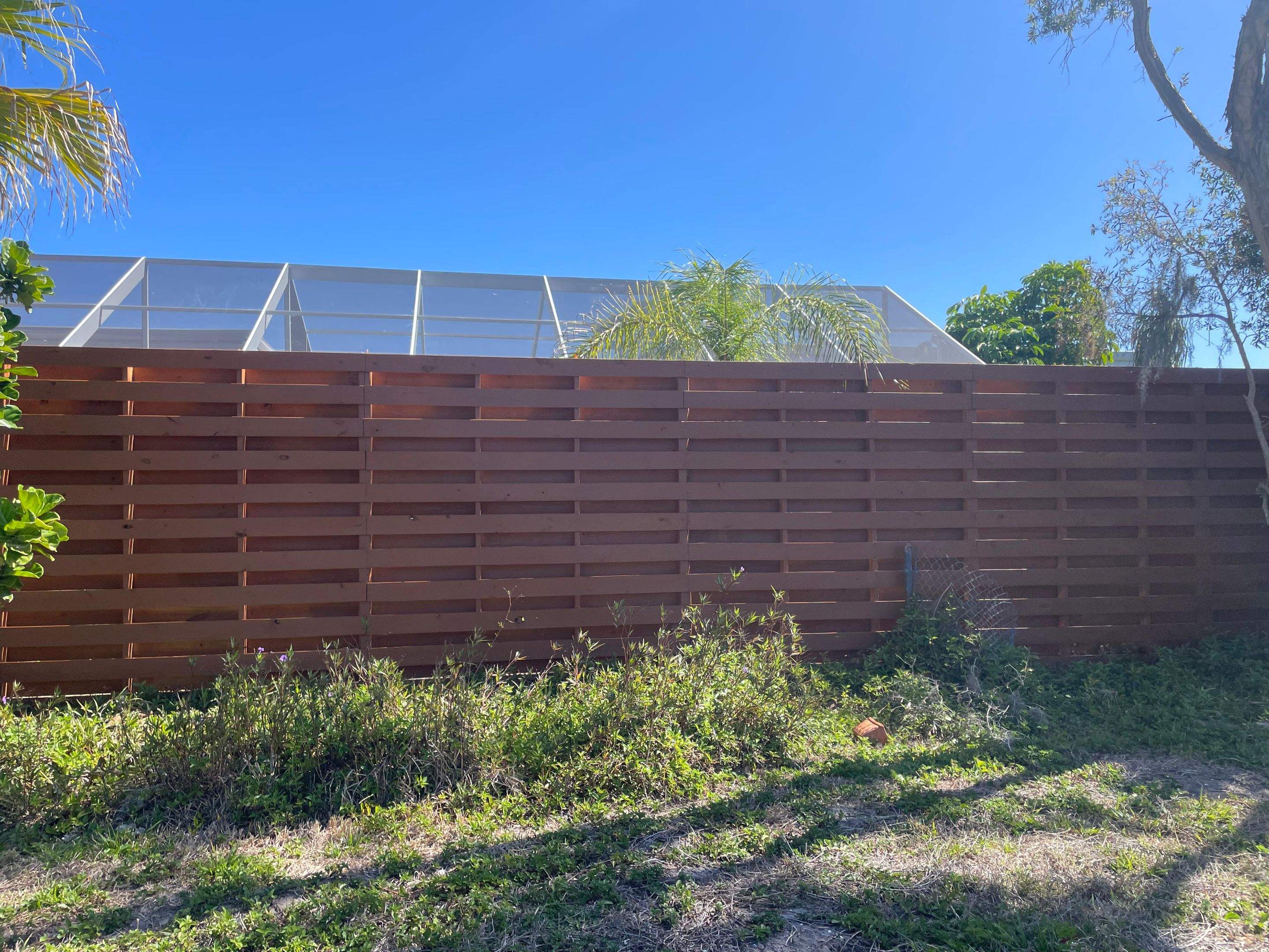 8'H Stained Shadowbox Wood in Nokomis by True Fence LLC