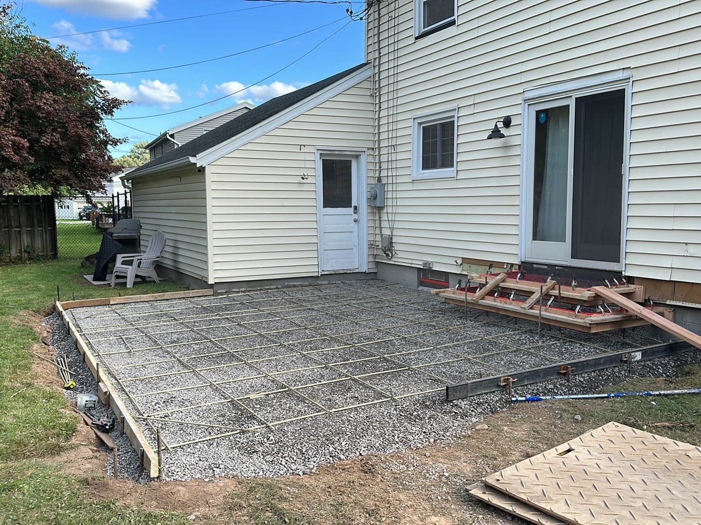 York Bluestone stamped patio  by NG Masonry & Construction LLC