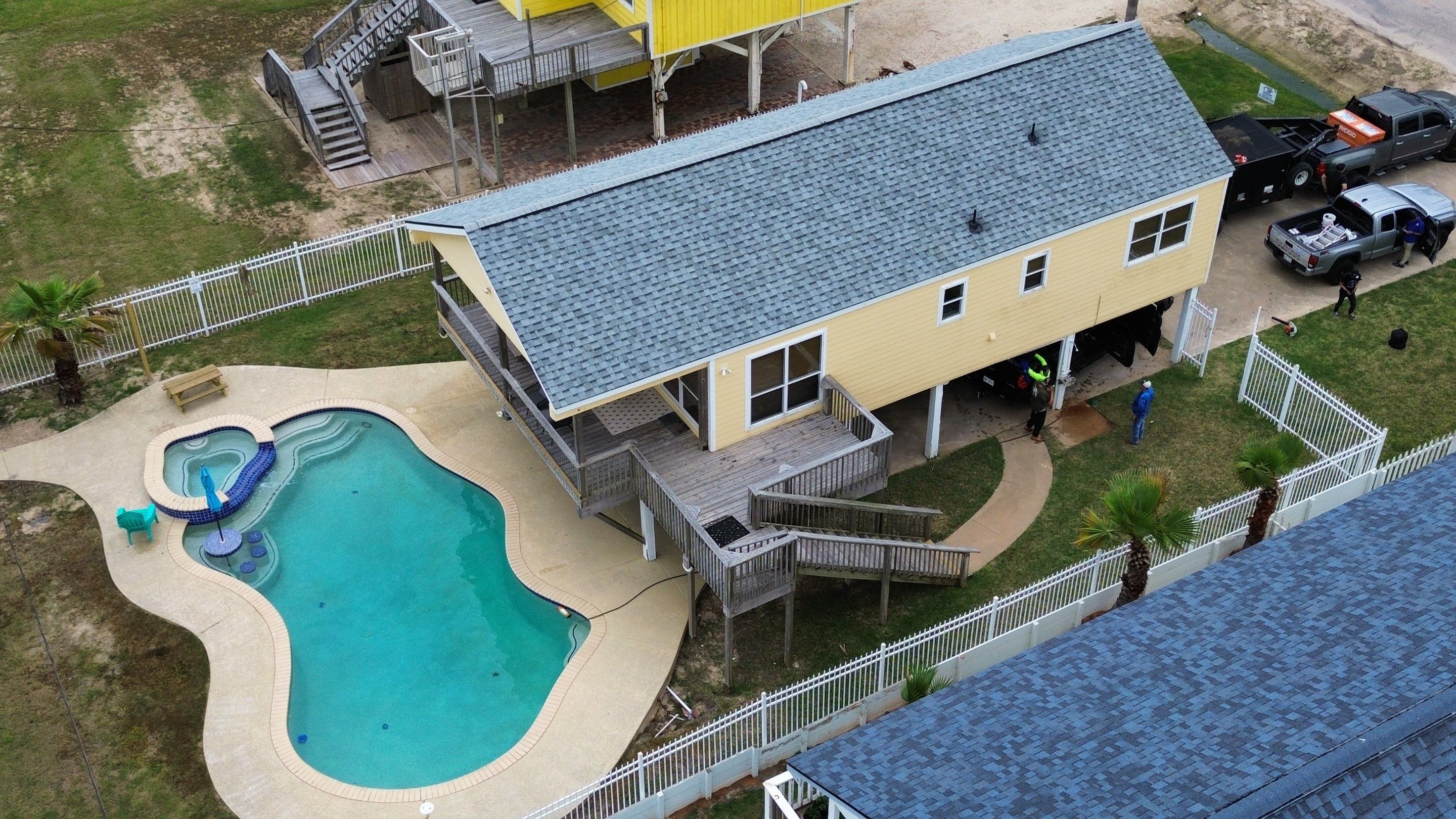 Roof Replacement using IKO Cambridge Dual Grey by CAP Roofing and Construction LLC