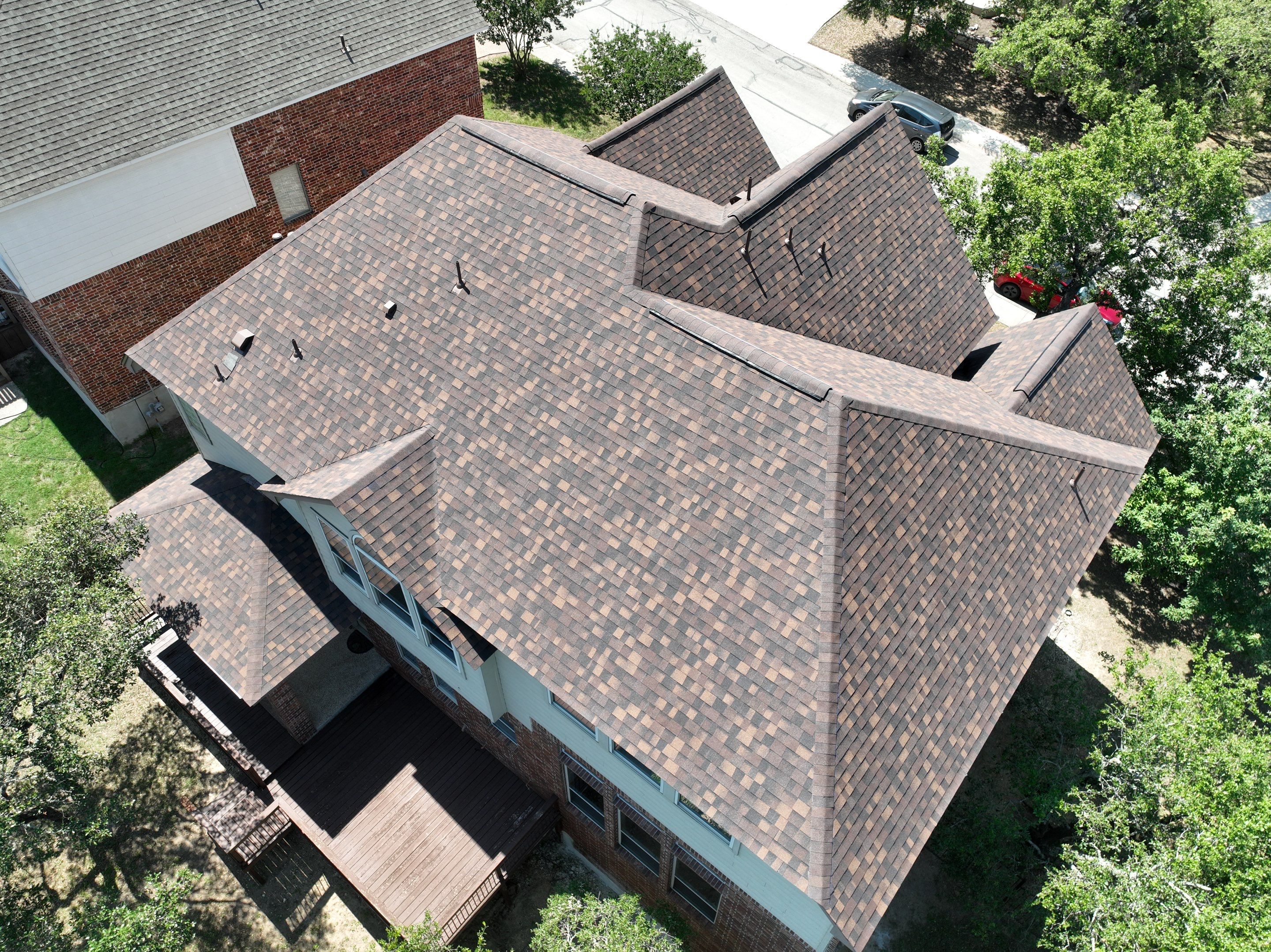 Residential Roof Replacement using Owens Corning 30 year Architectural Shingles by Premier Roofing and Contracting