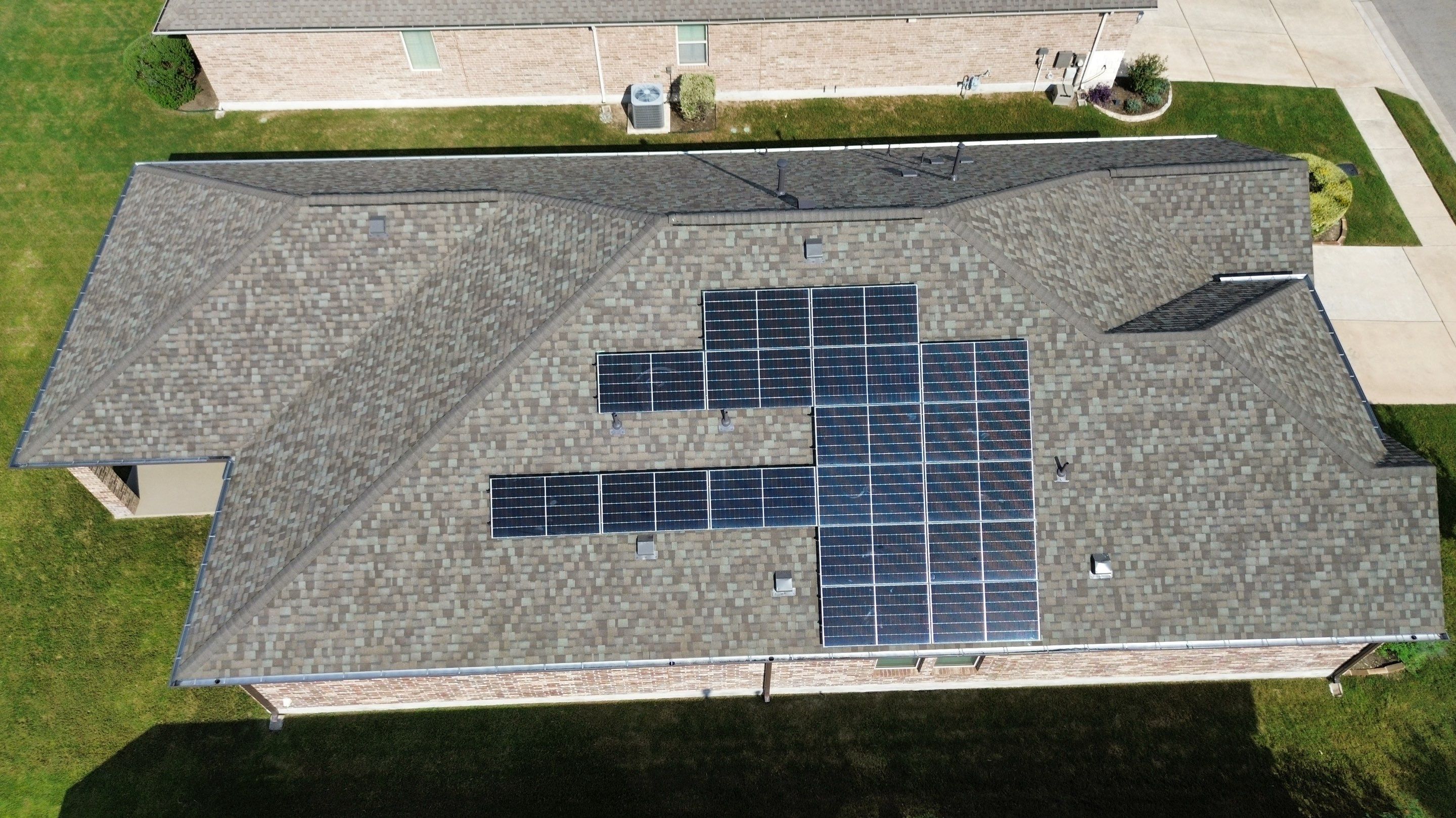 Full Roof Replacement with Solar Reinstall – Duration Driftwood | Round Rock, TX by Kstylez Roofing & Construction