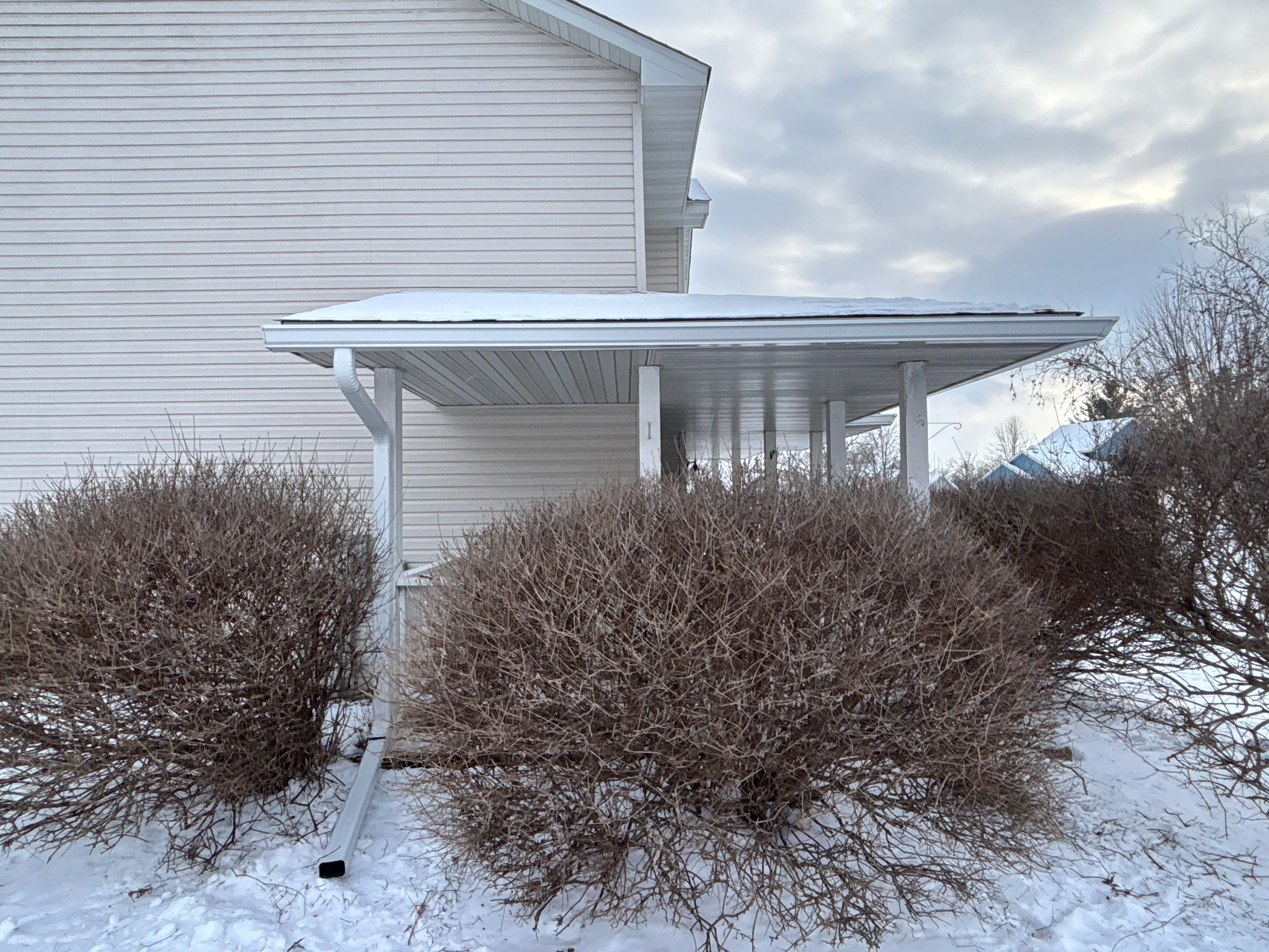 White Seamless Gutter and Downspout Installation in Big Lake by Next Level Seamless Gutters / Exteriors Inc.