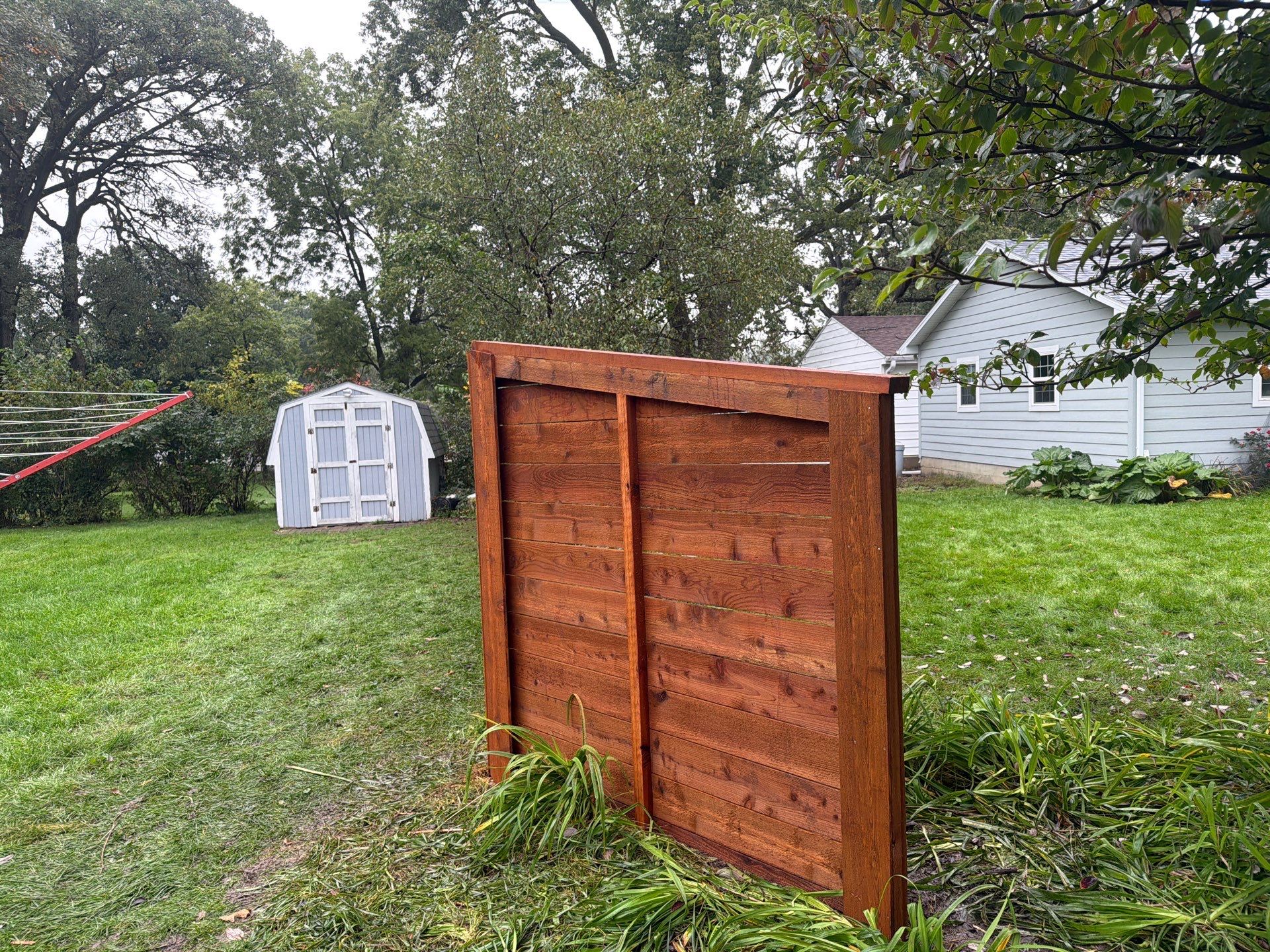 Stained Horizontal Cedar Wood Privacy Fence in Cedar Falls by Perfect Picket Fence and Stain