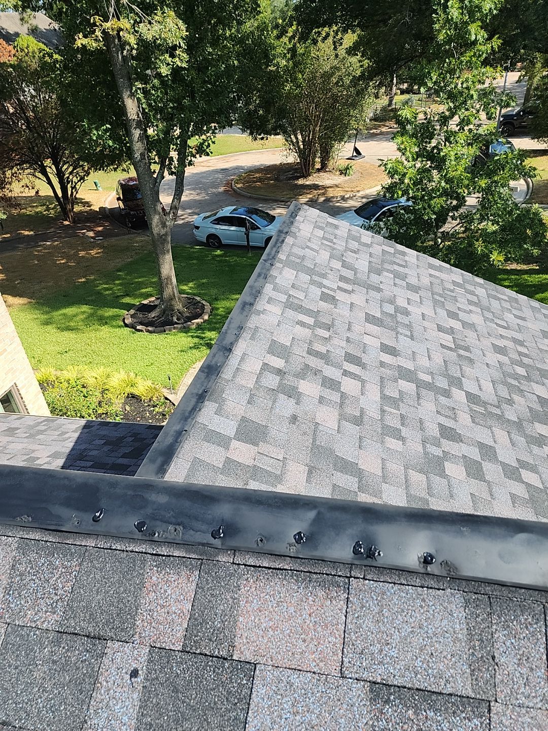 Residential Roofing Installation using Owen's Corning Duration (Lifetime) Shingles by Roof Repair Company