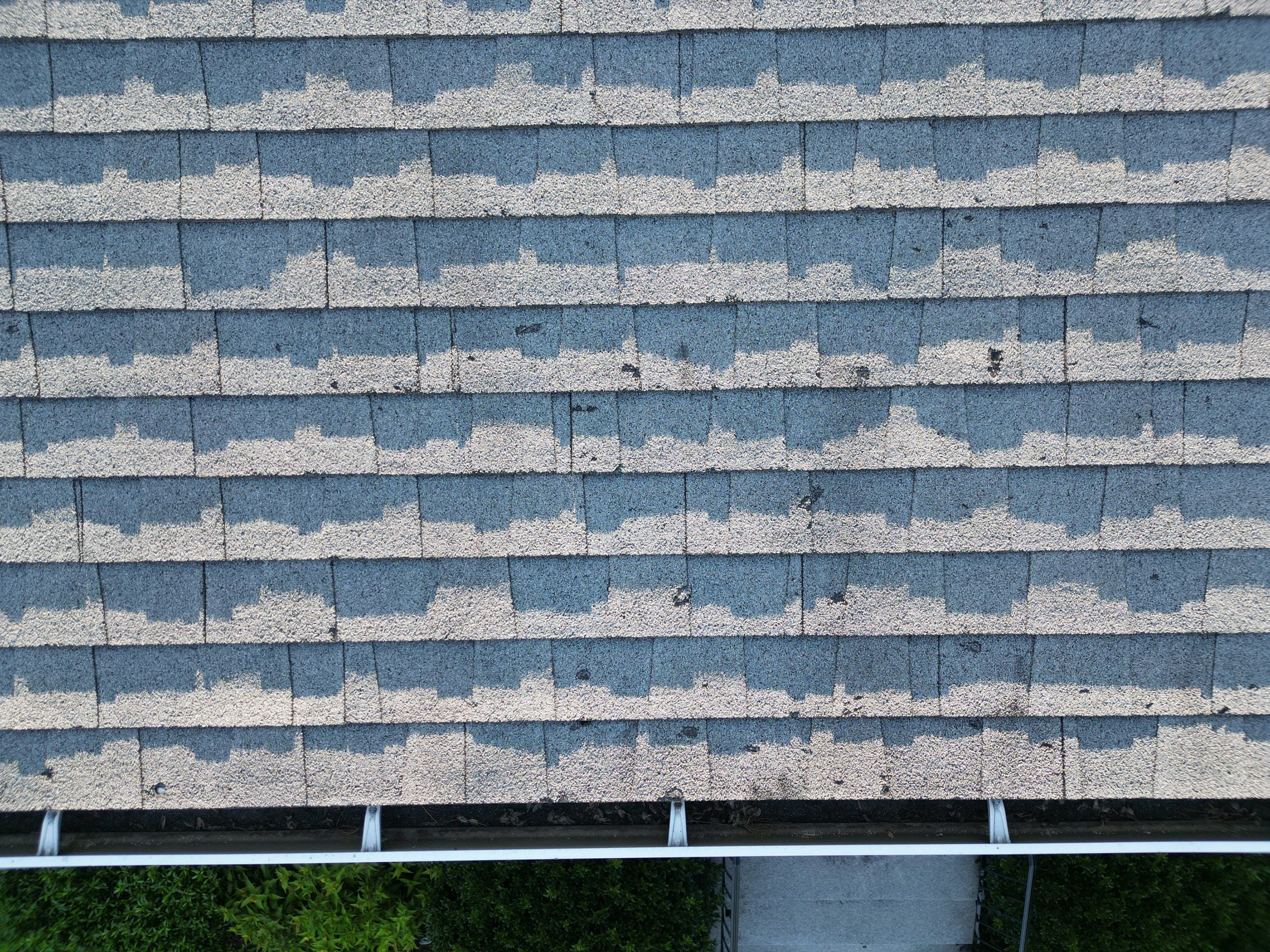 Complete Roof Replacement with Chimney Flashing, Gutter Guard System, and Vinyl Siding Repairs by Mighty Dog Roofing of Greater Middlesex County