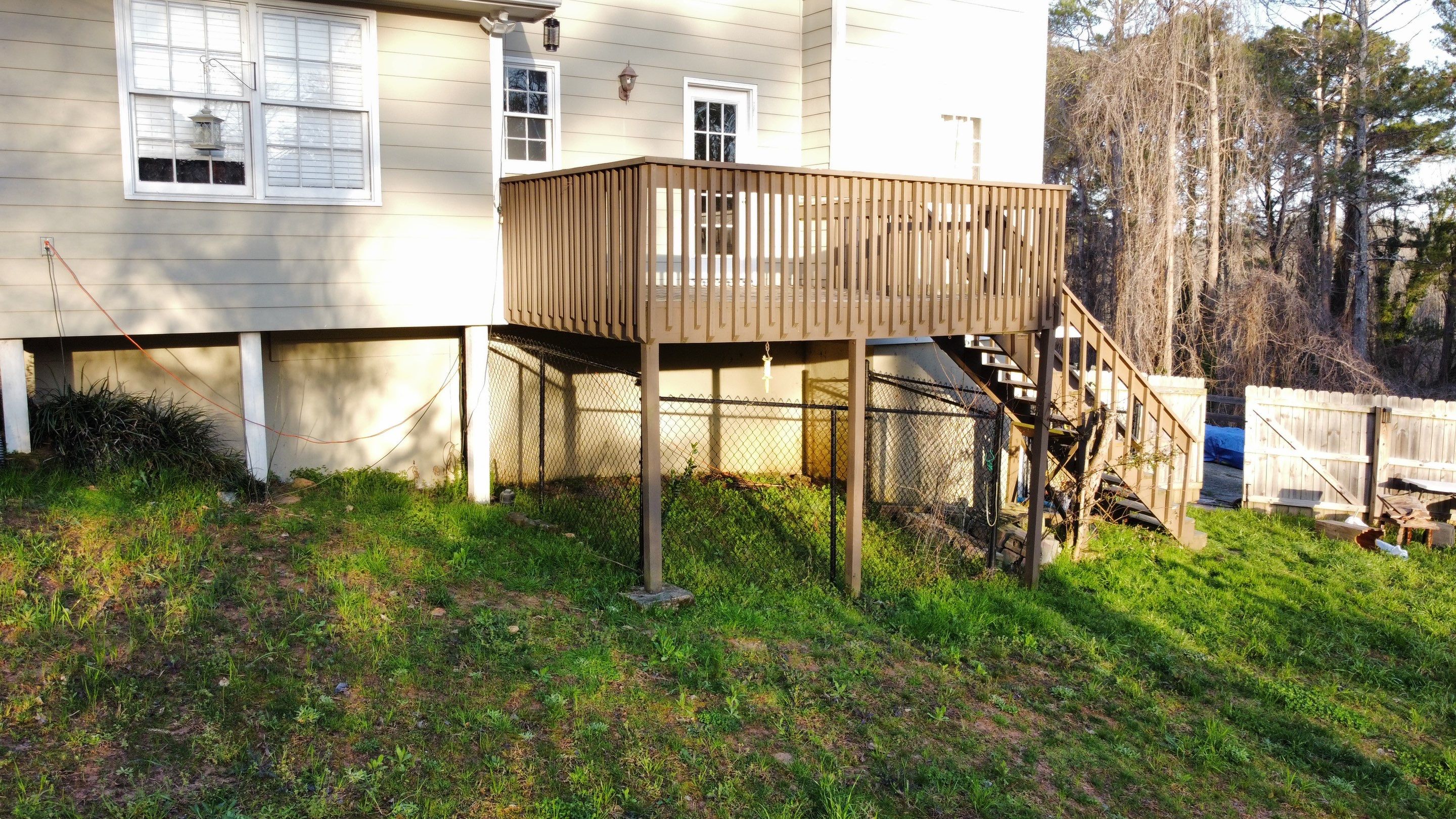 Elevated Pressure-Treated Wood Deck Replacement in Marietta by Swift Home Renovations