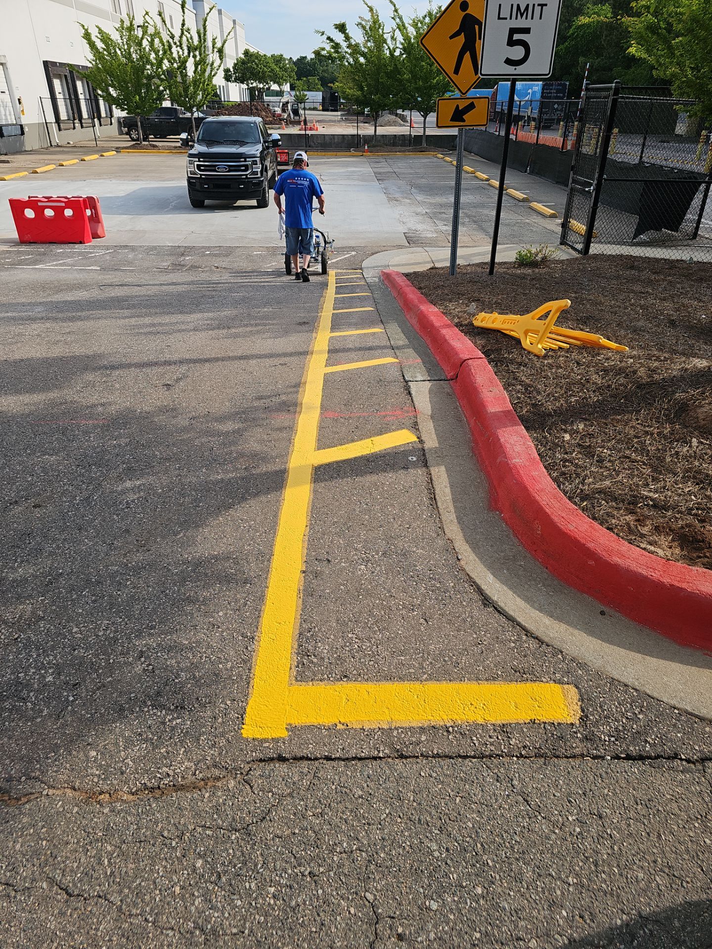 Striping Amazon Parking Lot  by Billy Weatherspoon Contractor