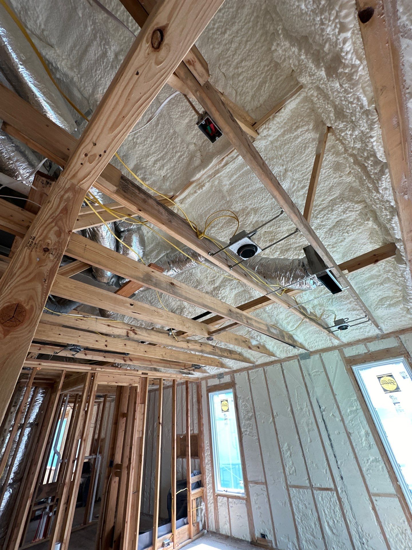 Open cell spray foam job completed at this beautiful custom home in Dallas TX by Apex Insulation Solutions