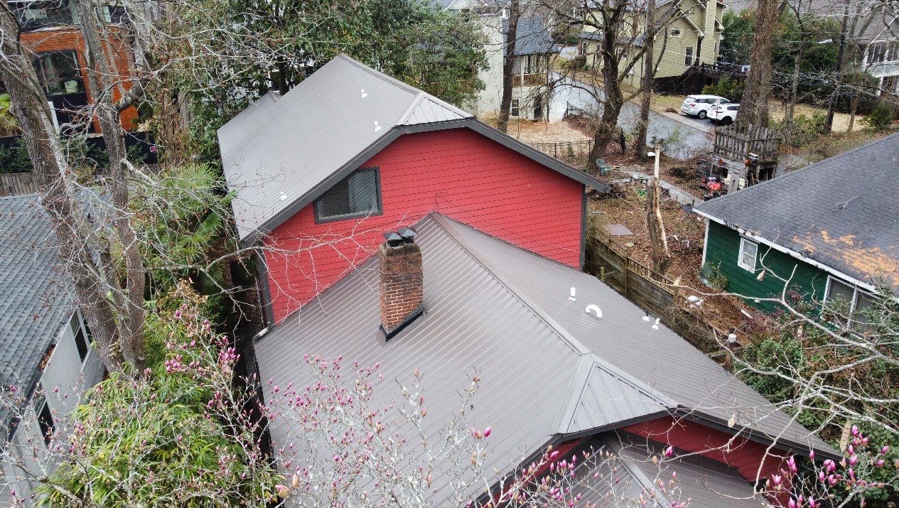metal roof install by Nailed It Roofing & Remodeling LLC