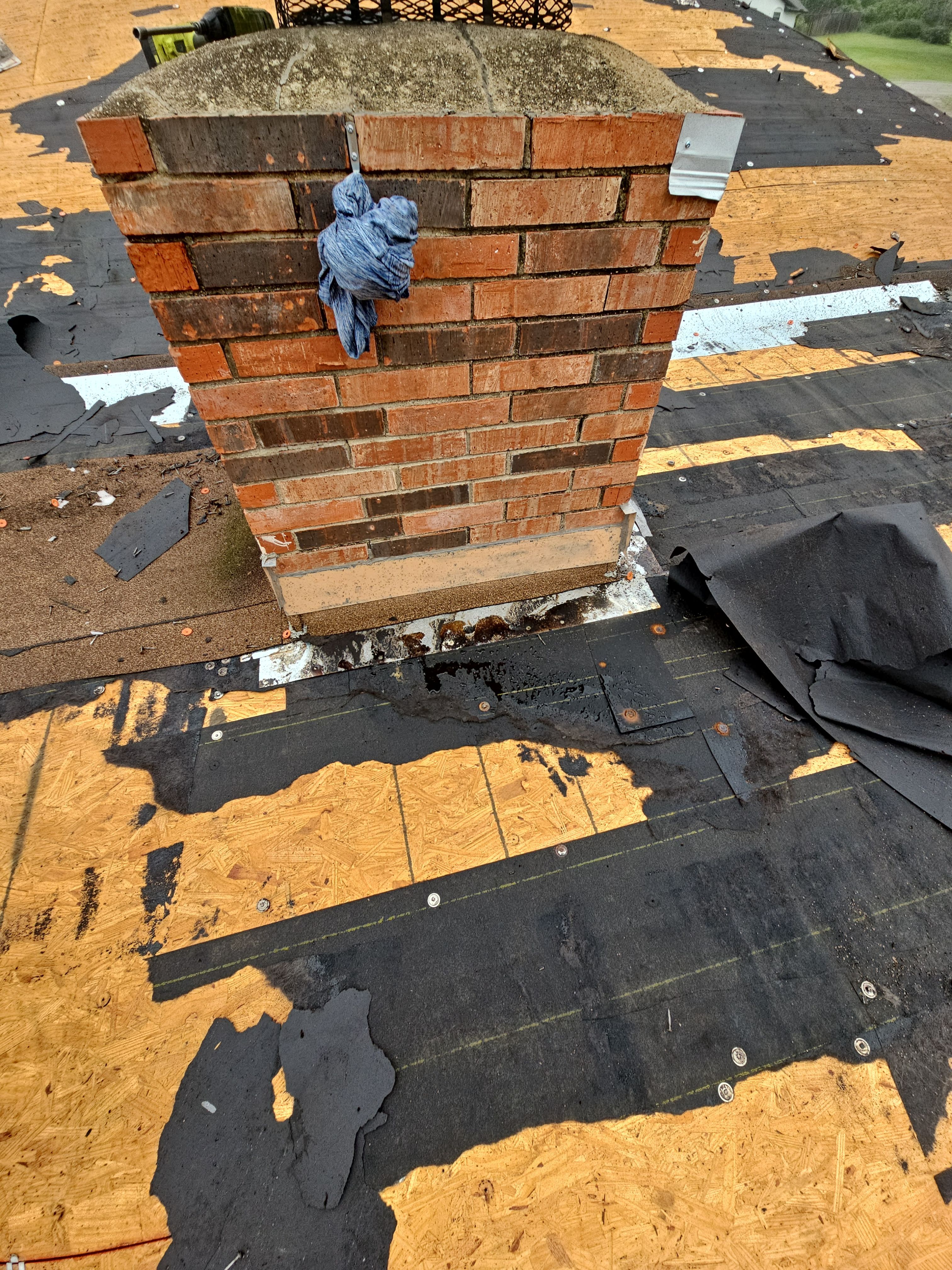 "Full Roof Replacement Due to Hail and Water Damage – Before & After" by road roofing llc