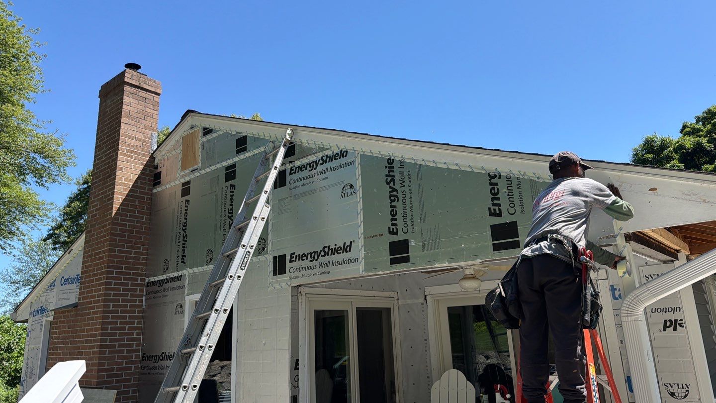 Siding Renovation with Cert Monogram D/4 x 12'6" Clapboard, Smoky Gray by DiGiorgi Roofing and Siding Inc