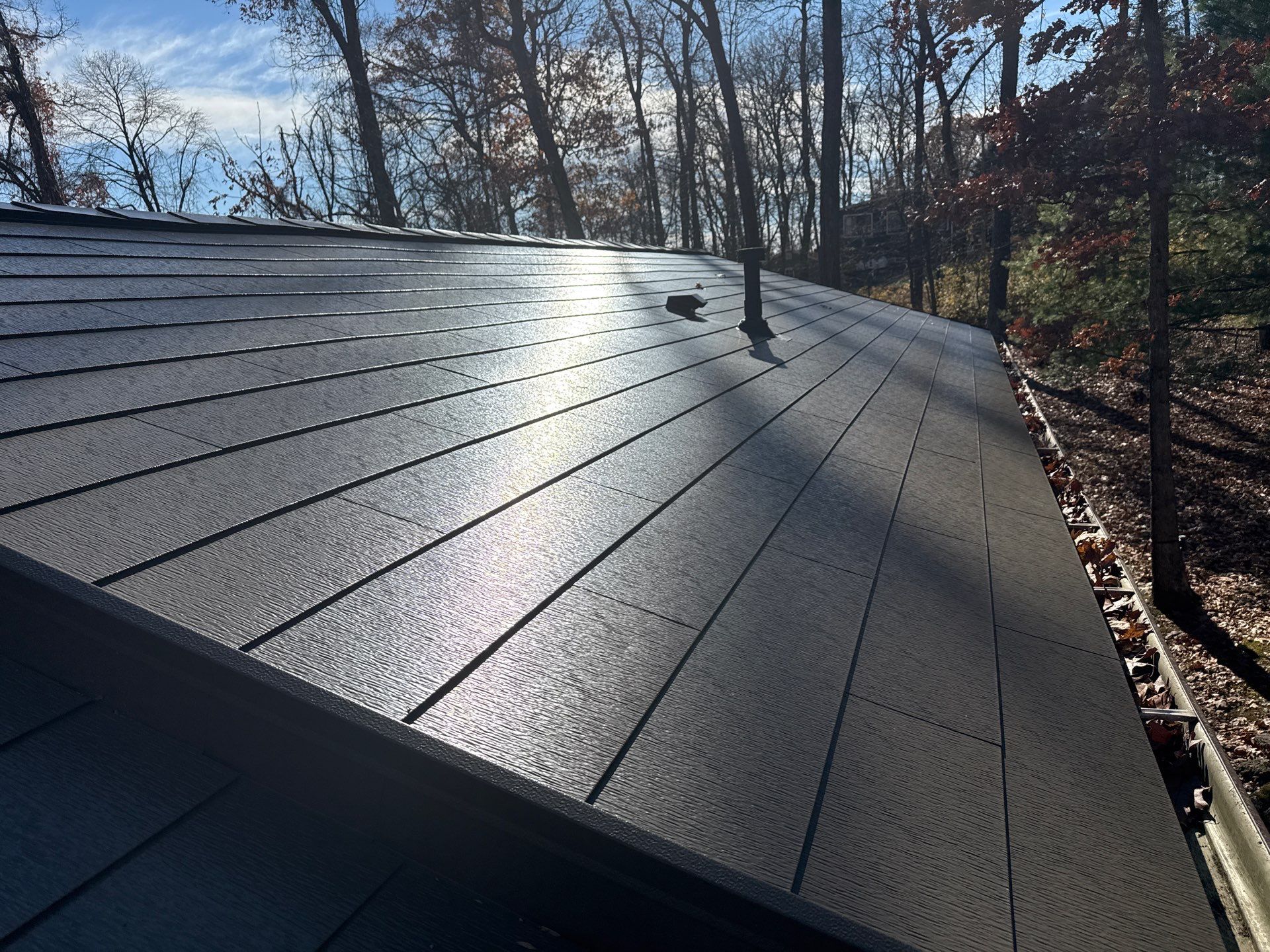 Roof replacement using GAF TimberSteel by American Home Contractors