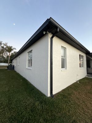 Black Aluminum Gutters with Matching Downspouts in Tampa FL