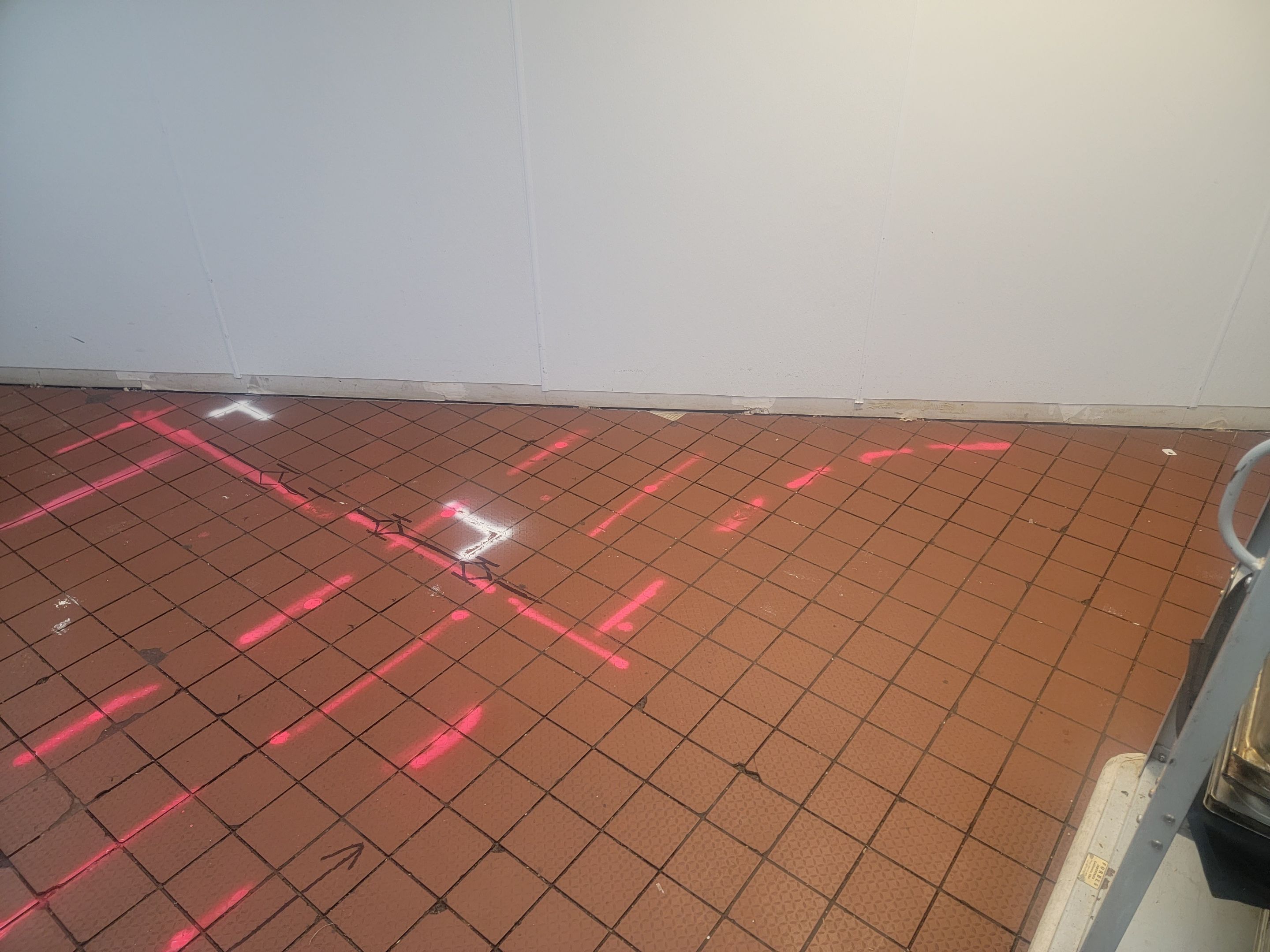 Marking Electrical Ducts within the concrete before saw cutting by Alsip Locating Service, LLC