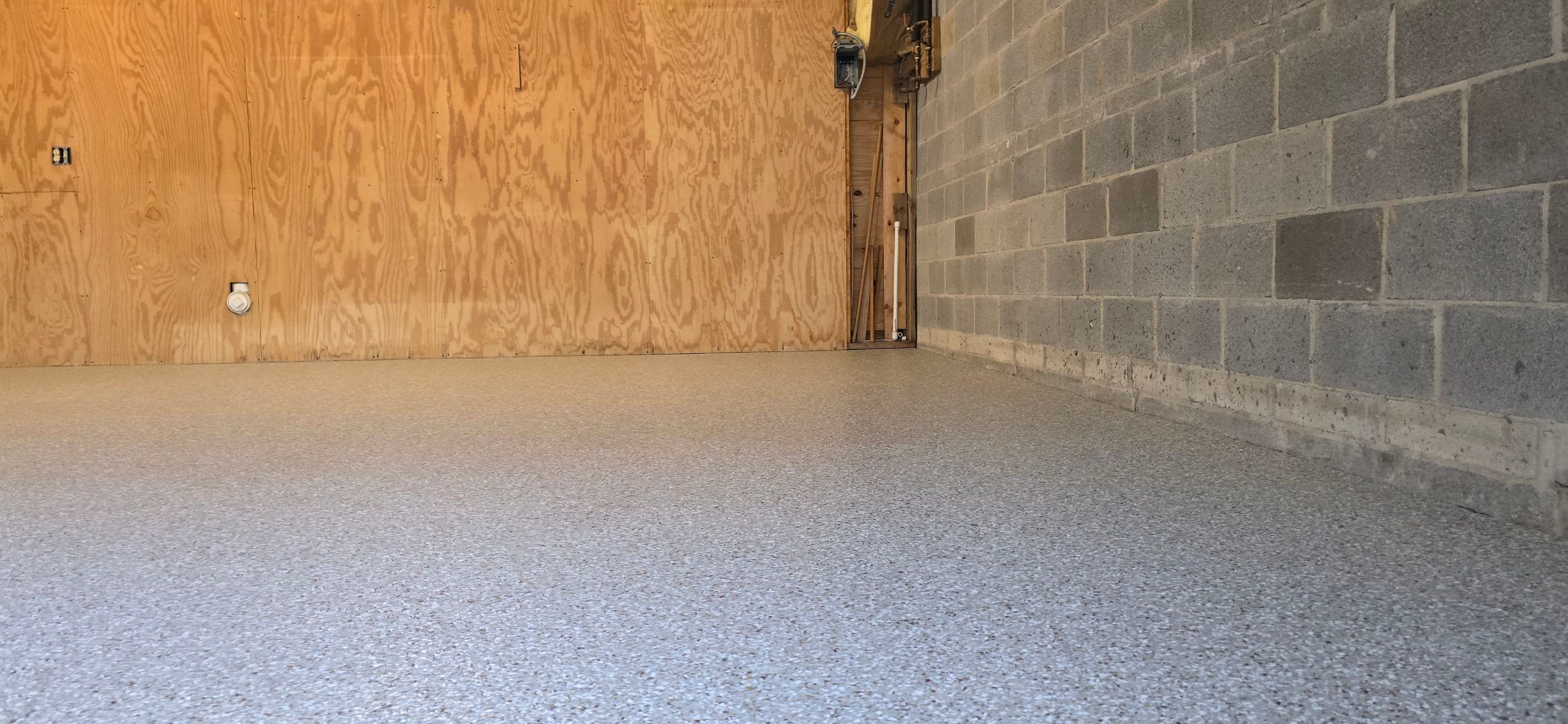 Garage & Sidewalk using Creekbed by Elite Floor Solutions