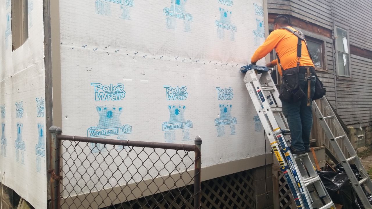 James Hardie Siding on Antique Home by Absolute Roofing and Construction