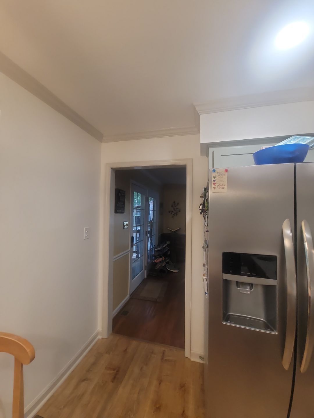 A Pathway to Personality – A Two-Tone Kitchen Transformation in Apex by Elite Remodeling and Design LLC