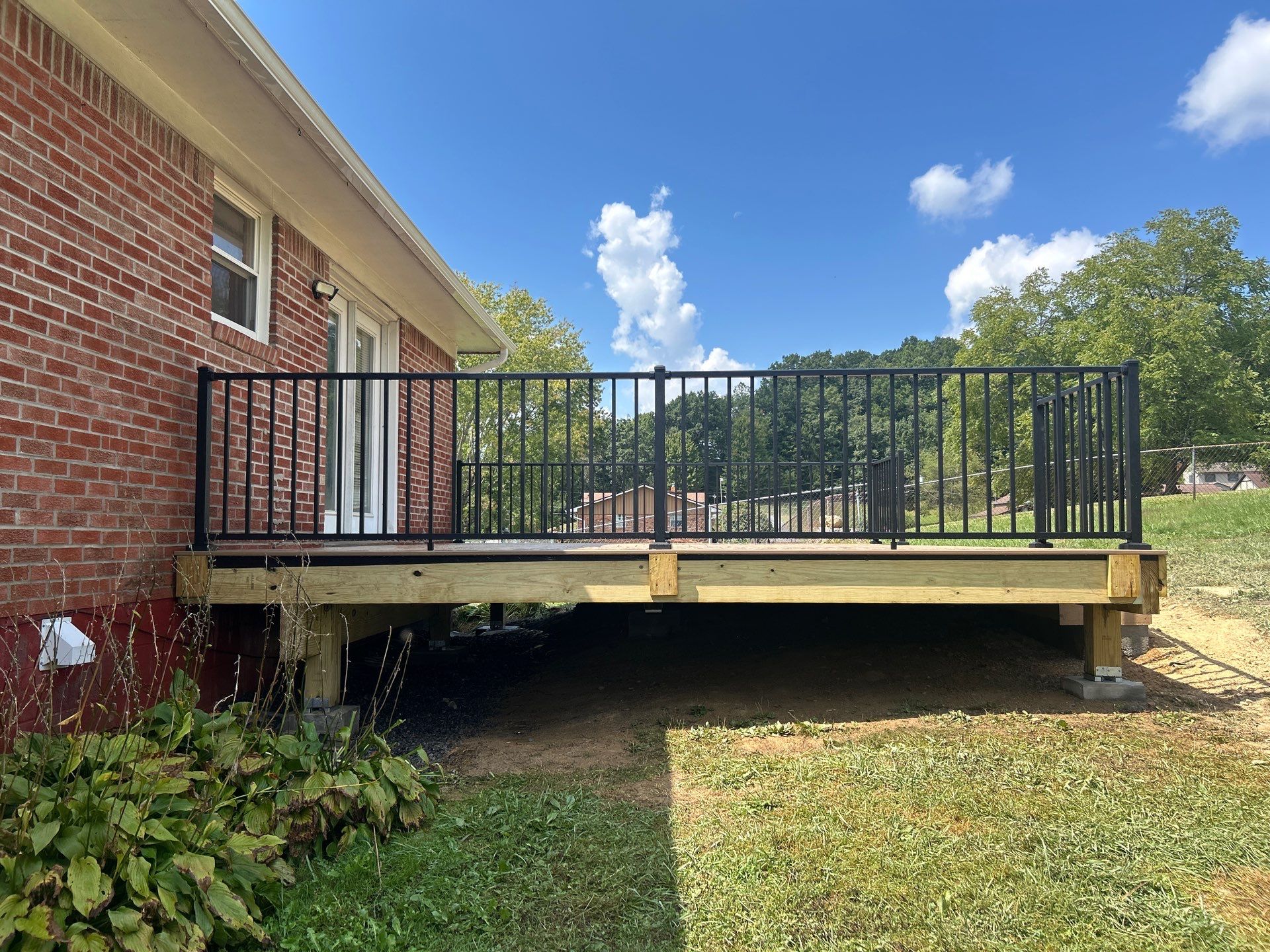 Composite Deck Replacement and Metal Railing Installation in Beckley by Walnut Hollow Decks & Outdoor Living