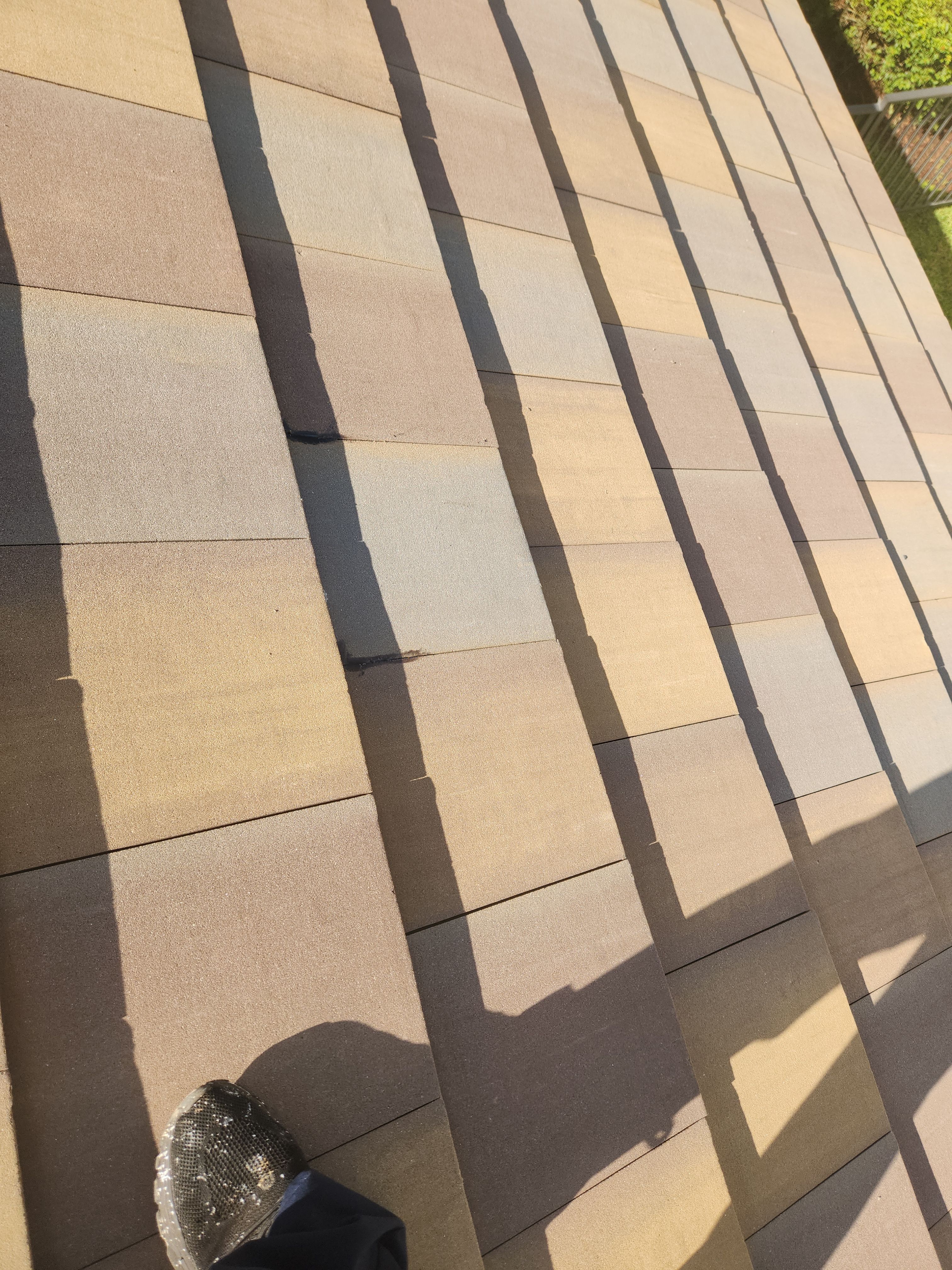 Concrete Tile Roof Repair for Residential Home in Wellington by Aastro Roofing