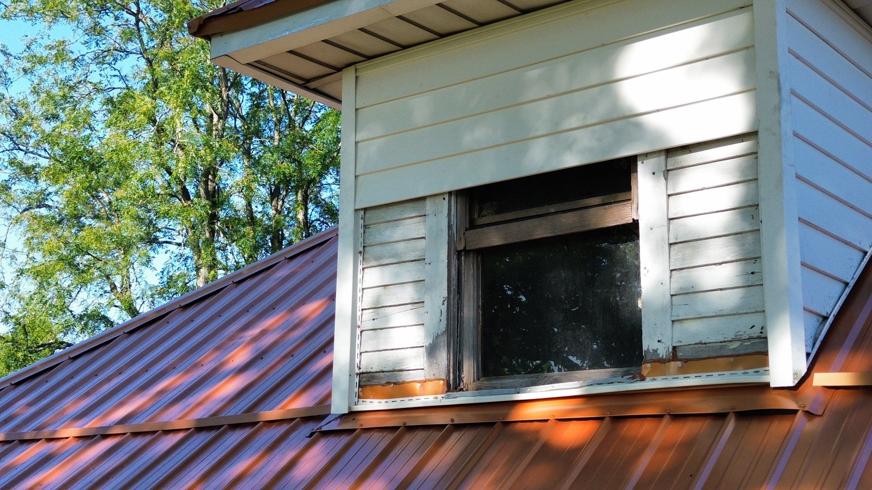 Residential Roofing Installation using Performance Panel Metal - Copper Metallic by RoofX 
