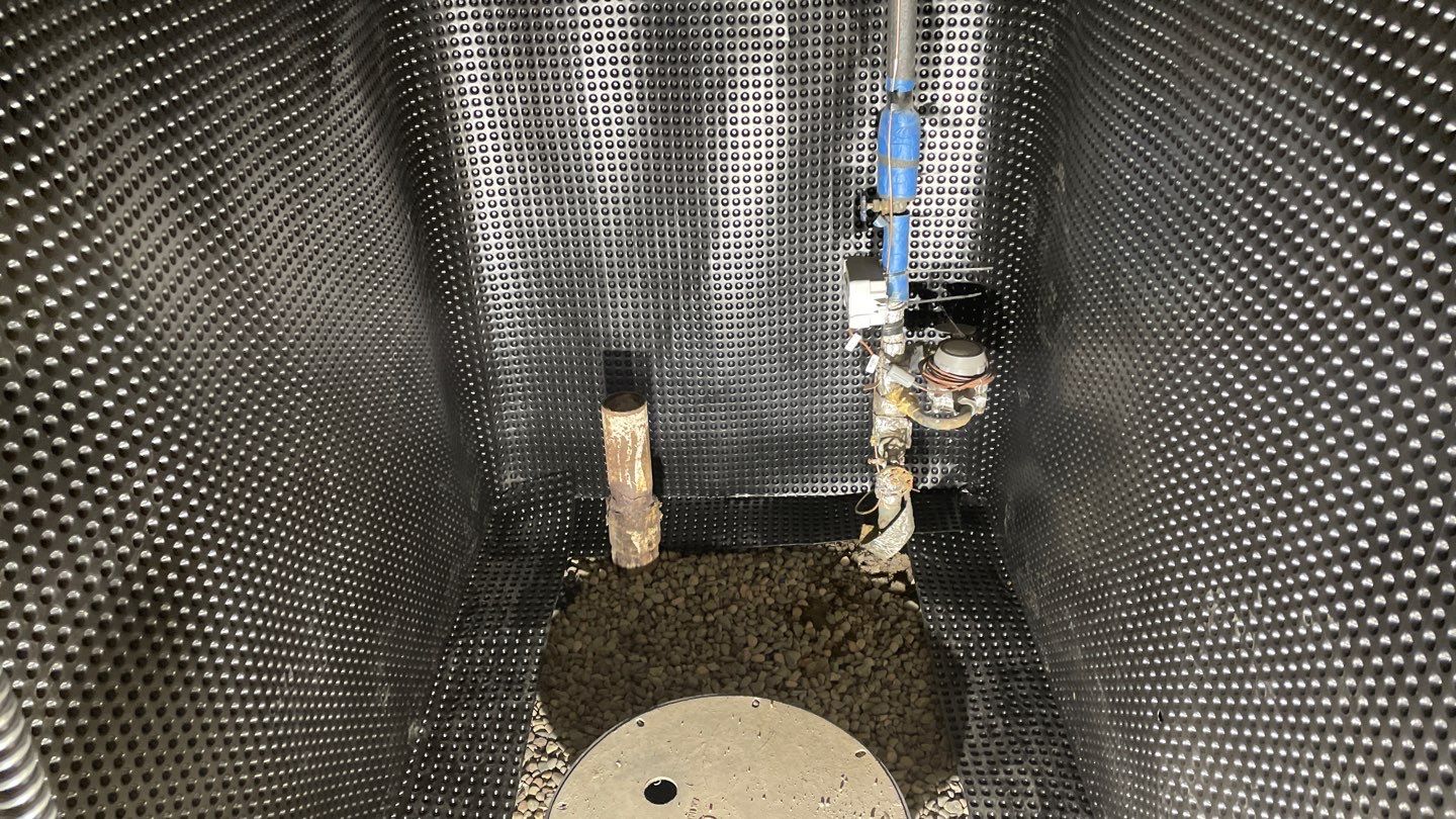 Interior Drain Tile & Sump Pump System in West Minneapolis by Waterproofing Northeast