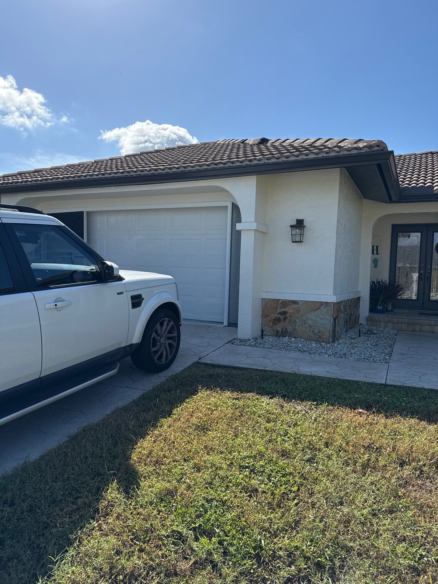 Black Seamless Gutters for Modern Homes in Punta Gorda by Gutter Professors