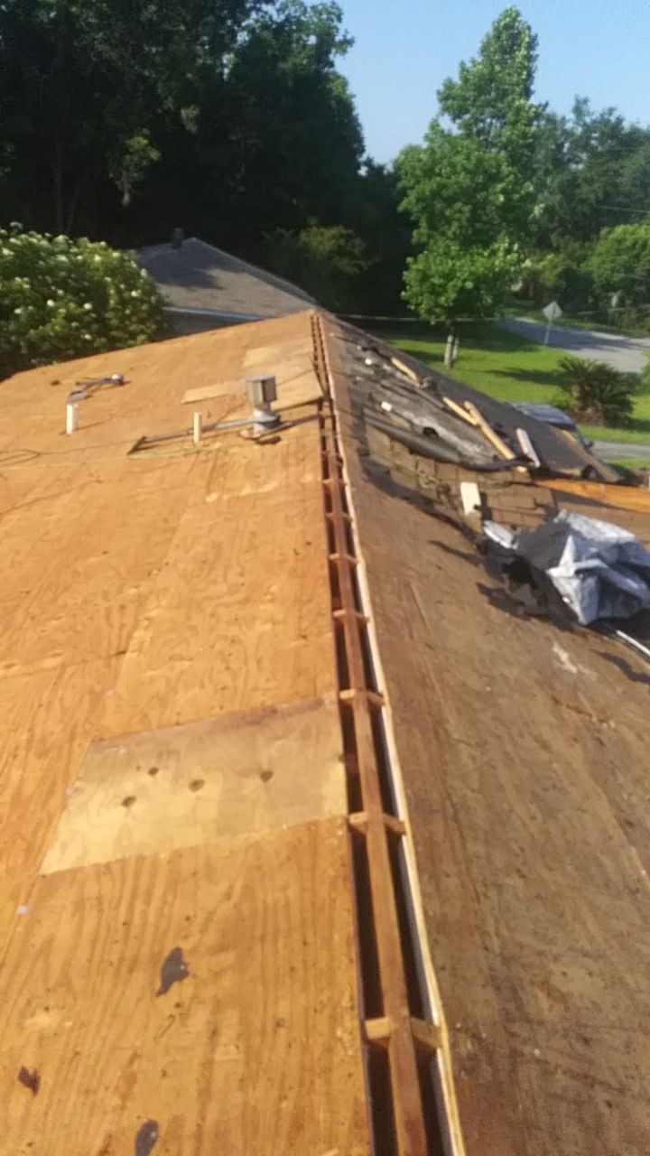 Residential Roofing Installation using Roof Replacement by American Roofing & Construction LLC