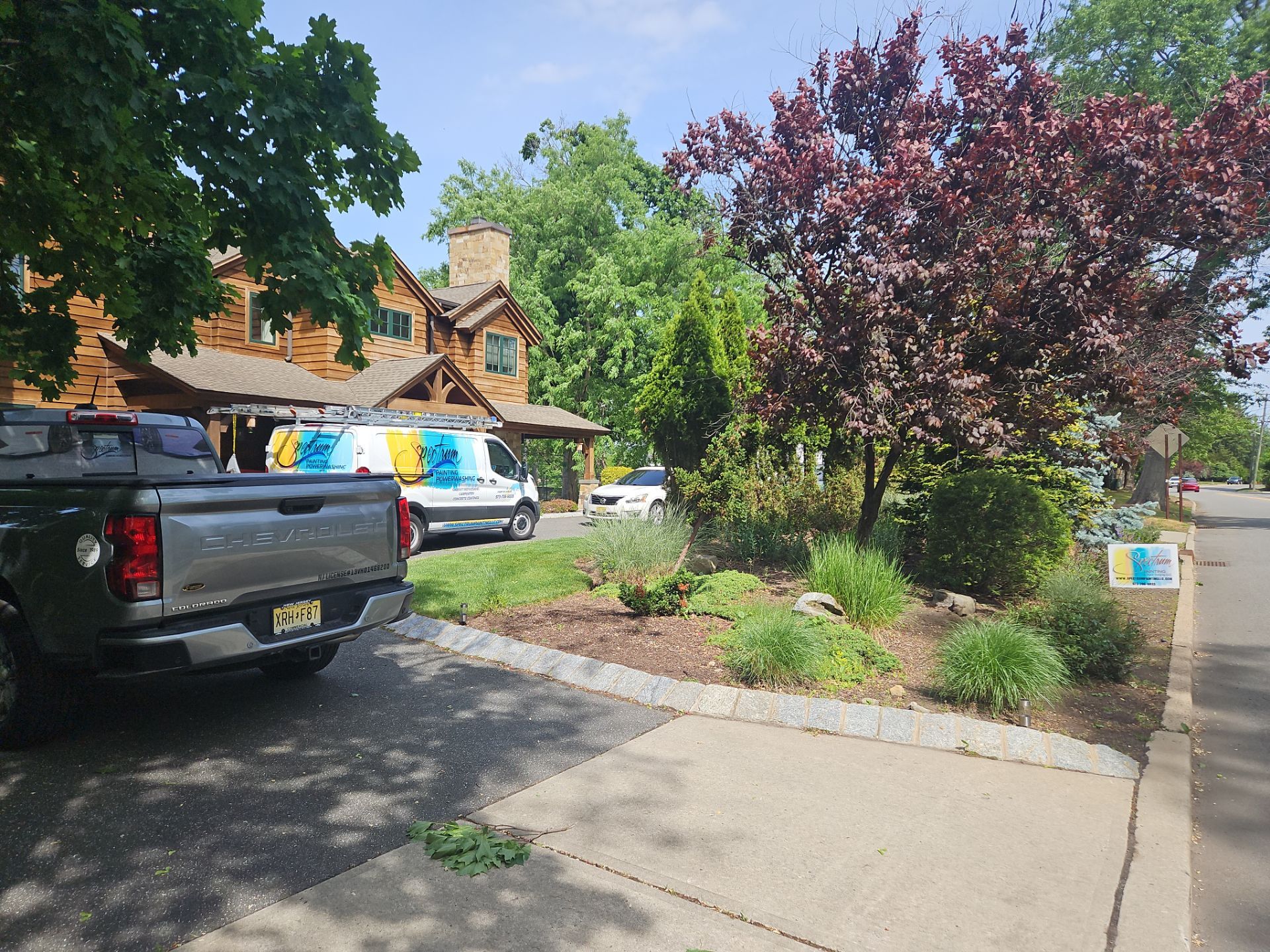 Exterior Powerwashing and Maintenance for a Teaneck Timber Home by Spectrum Painting, LLC