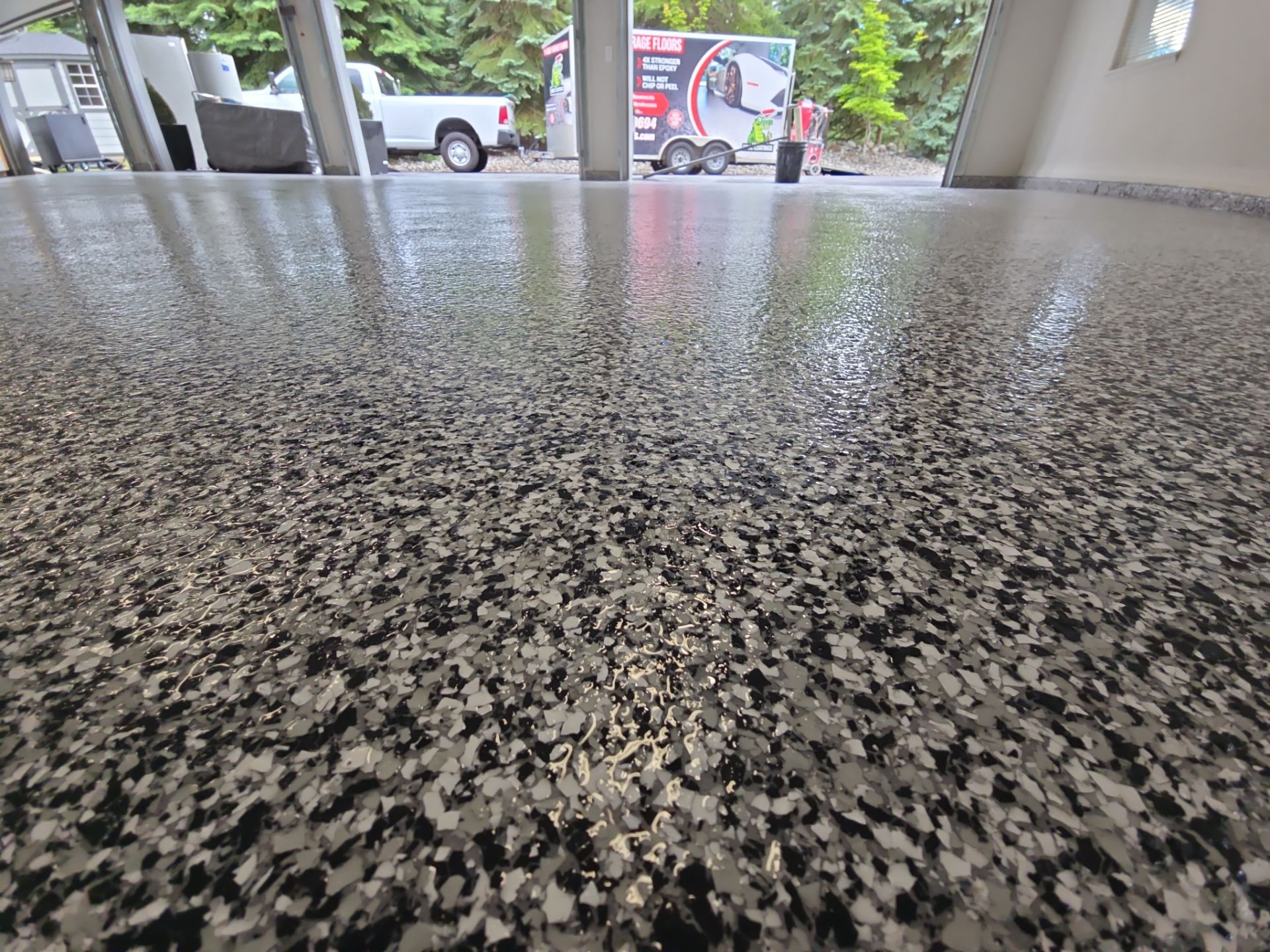 Custom Domino Flake Garage Floor Transformation in Coeur d'Alene by Croc Coatings, LLC