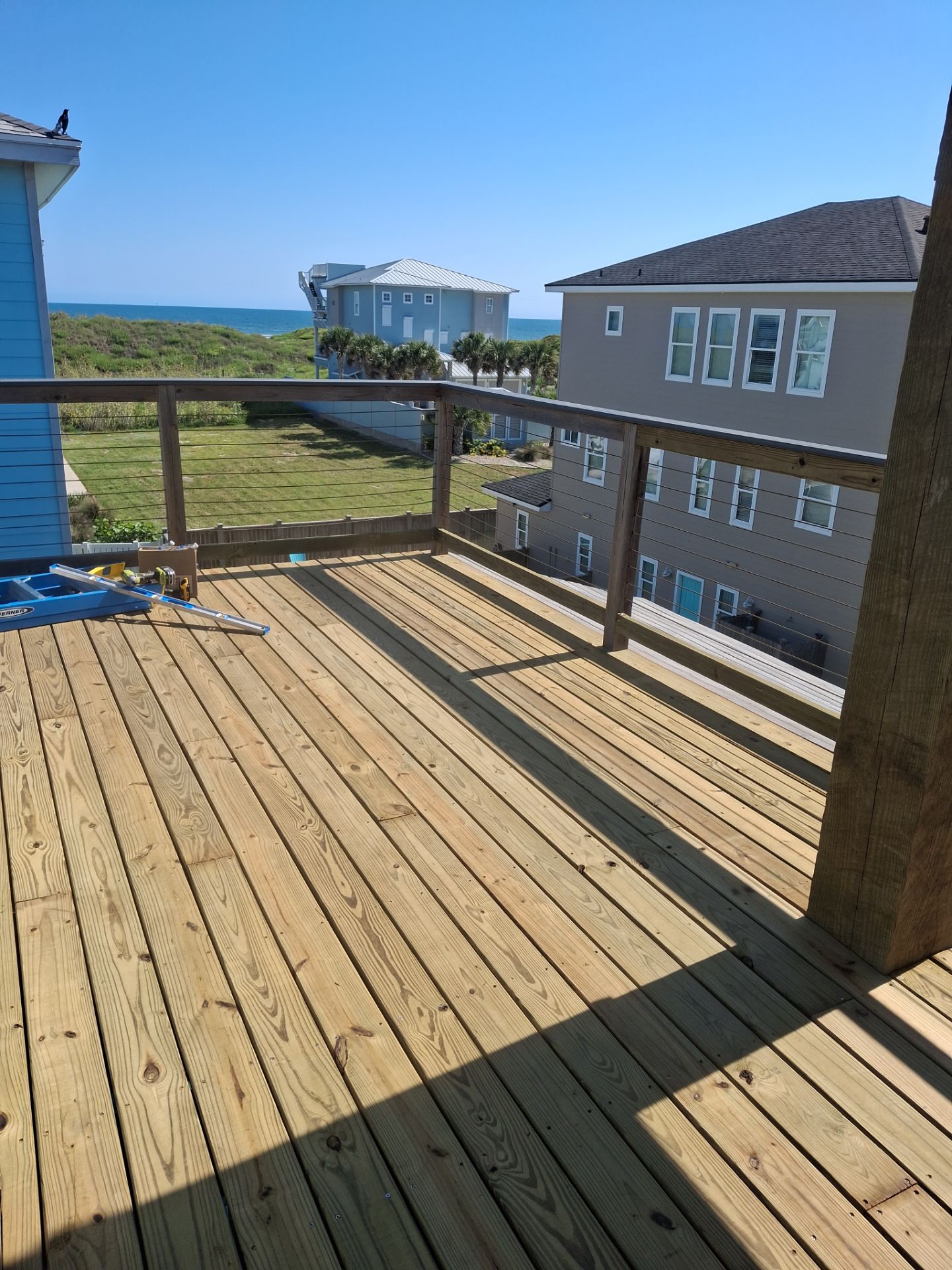 Roof Top Clubhouse on the Beach by Bayfront Roofing and Construction