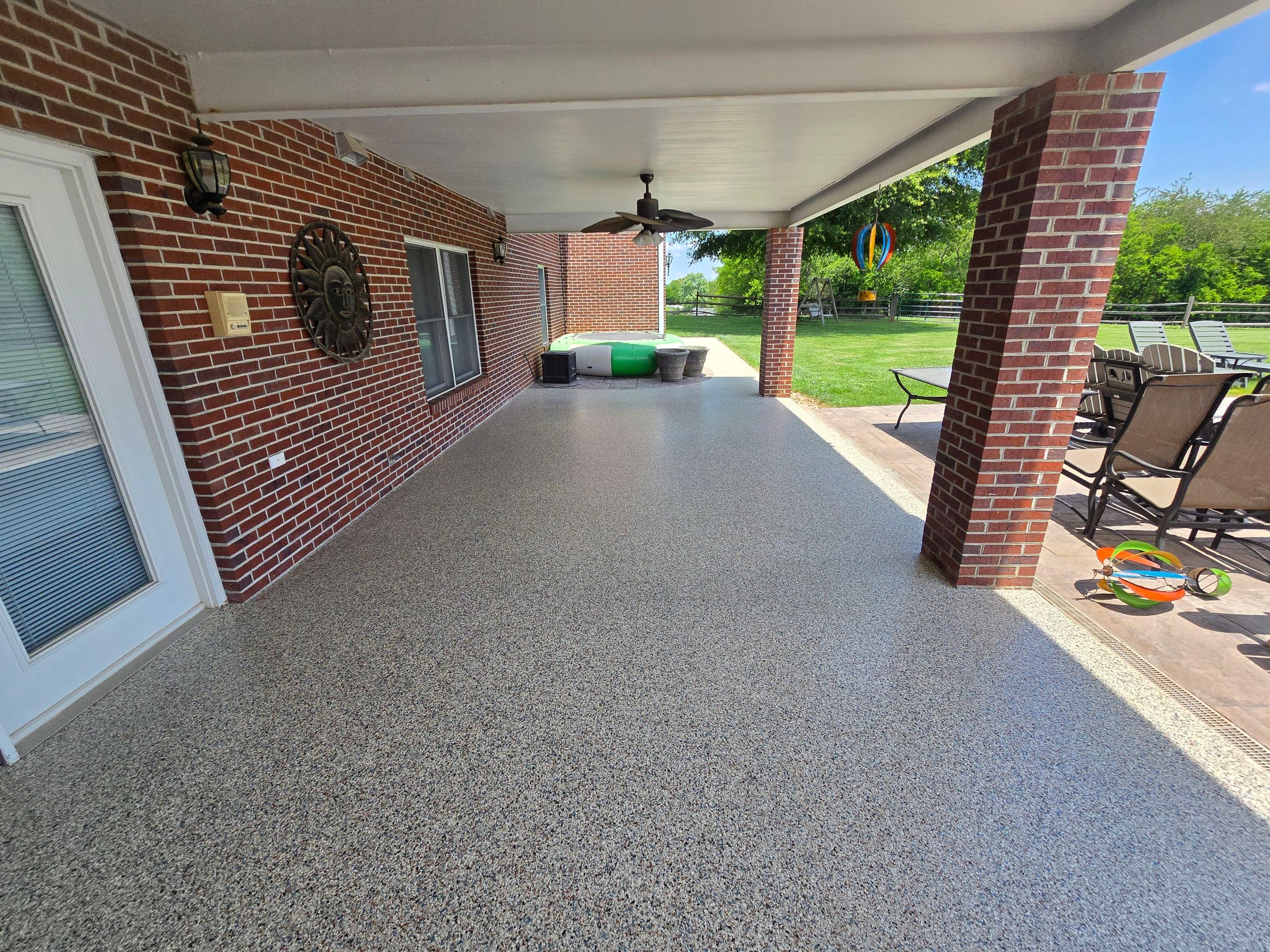 Pool Deck and Porch Using Brownstone and Coldwater Canyon by Elite Floor Solutions