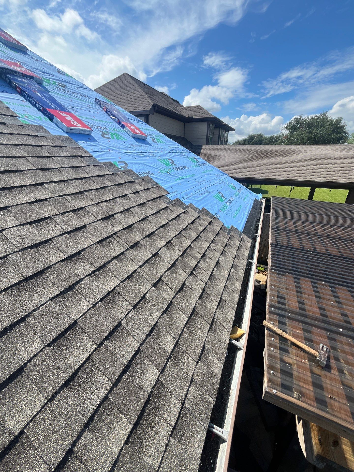 Residential Roofing Installation using GAF Timberline HDZ (weathered wood) by WABO Roofing Systems 