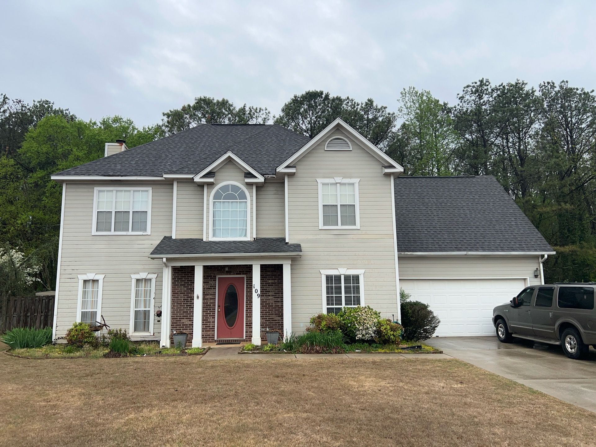 Evening Blue Hardie + Windows by Freedom Exteriors
