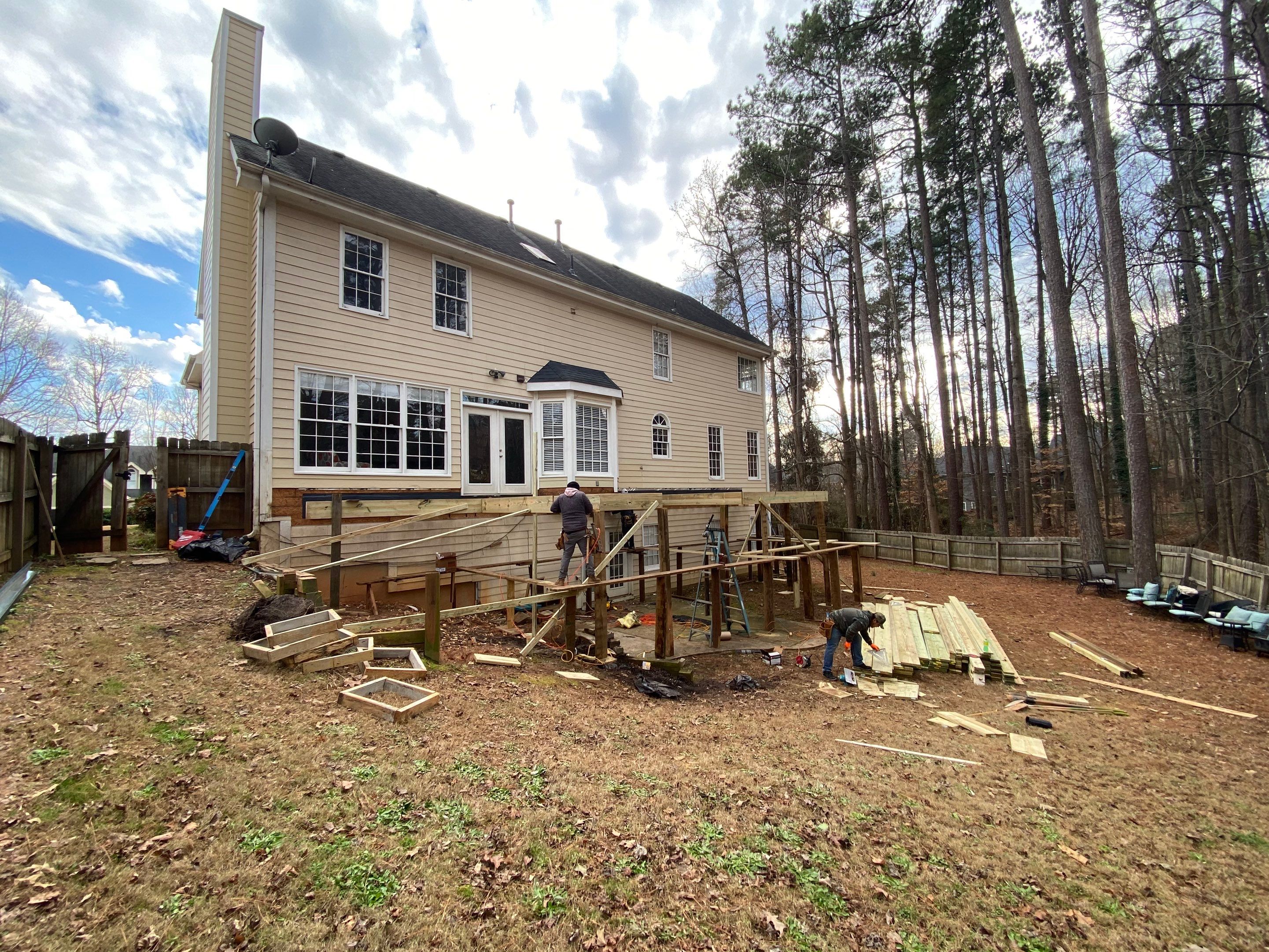 Elevated Pressure-Treated Wood Deck Replacement and Staircase in Duluth by Swift Home Renovations