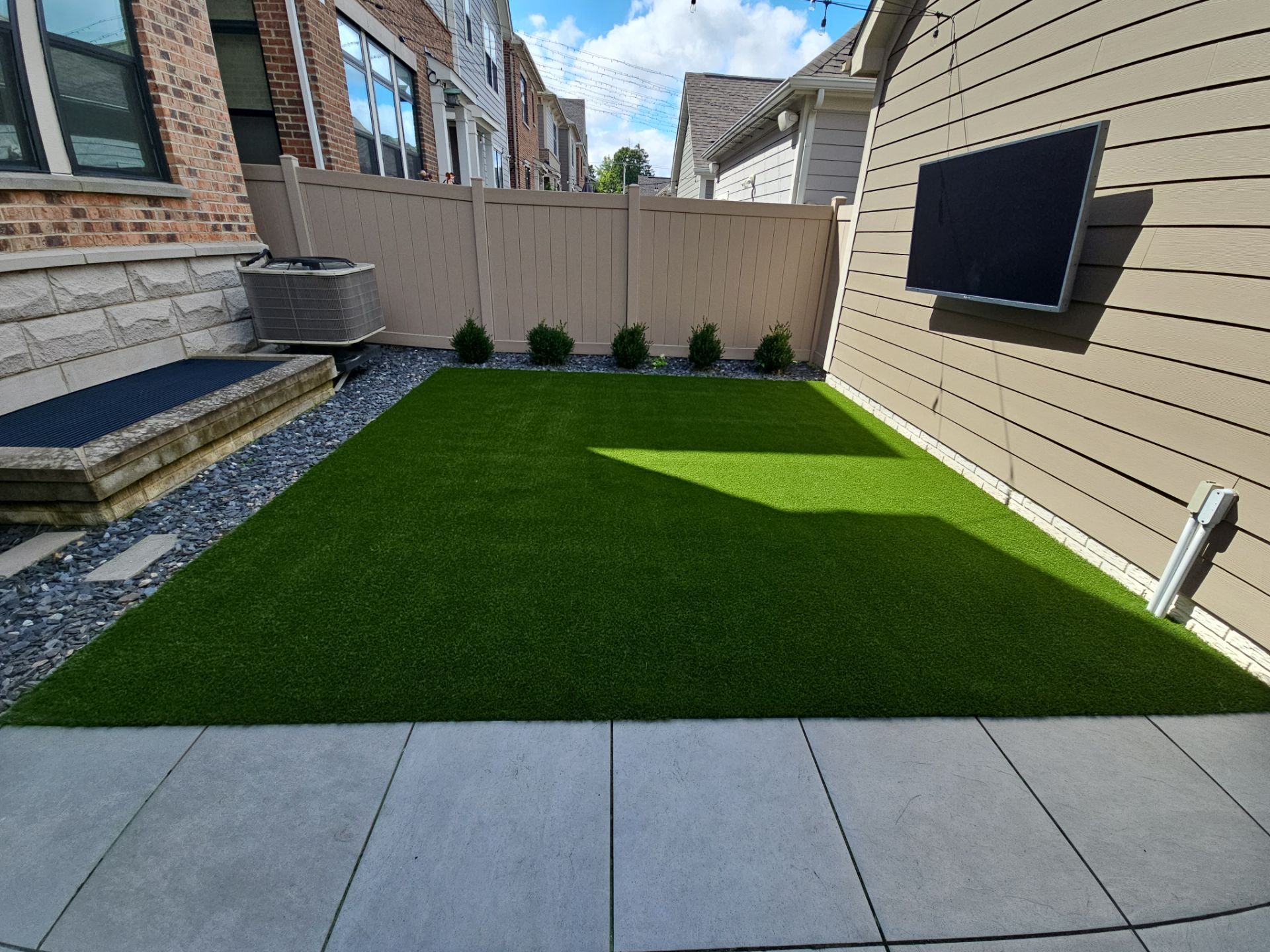 Backyard Paver to Turf Renovation by Southwest Greens Midwest