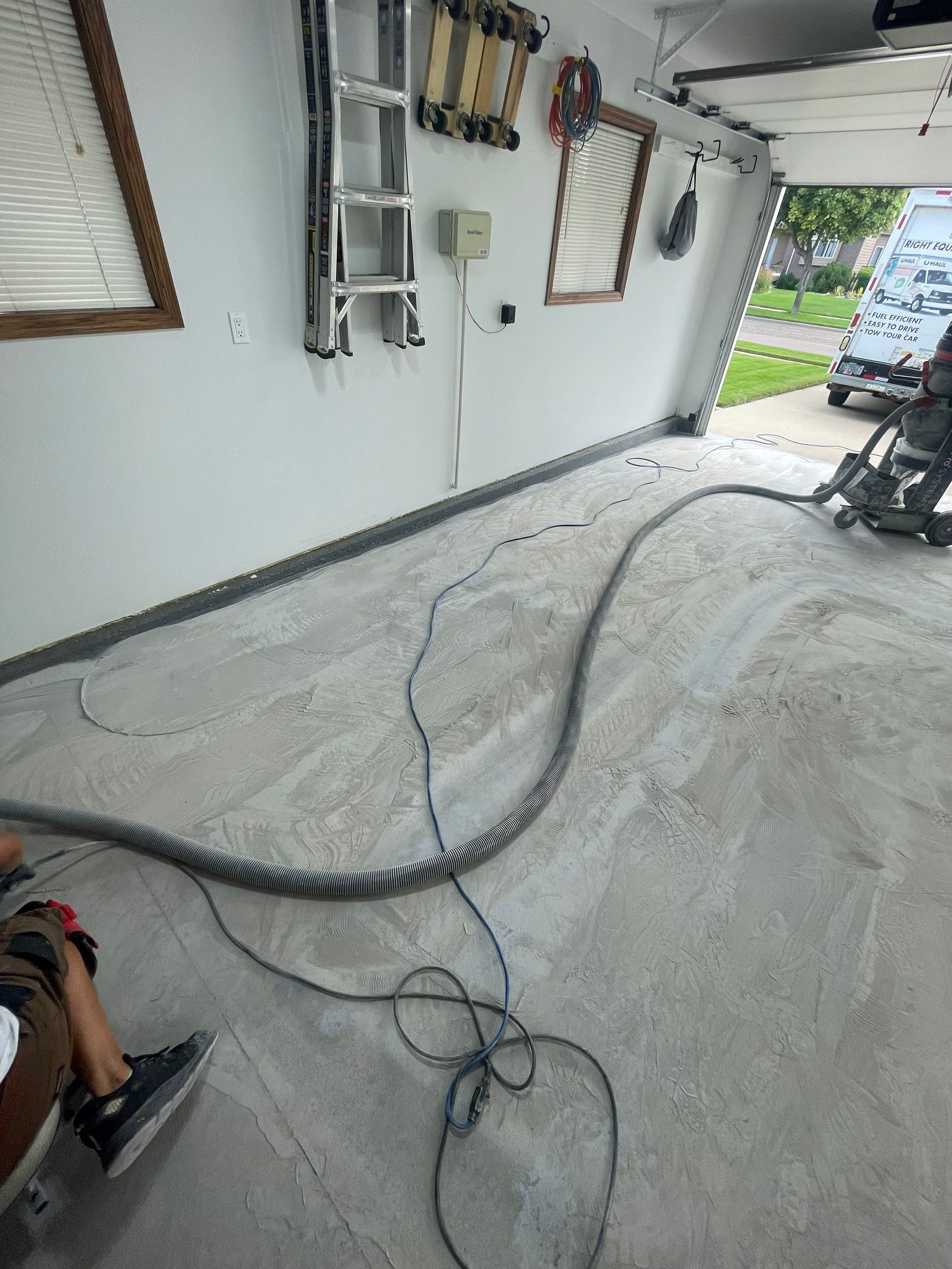 Multi-Car Garage Concrete Coating with Coyote Flake Finish in Sioux Falls by Select Painting, Coatings & Garage Cabinets