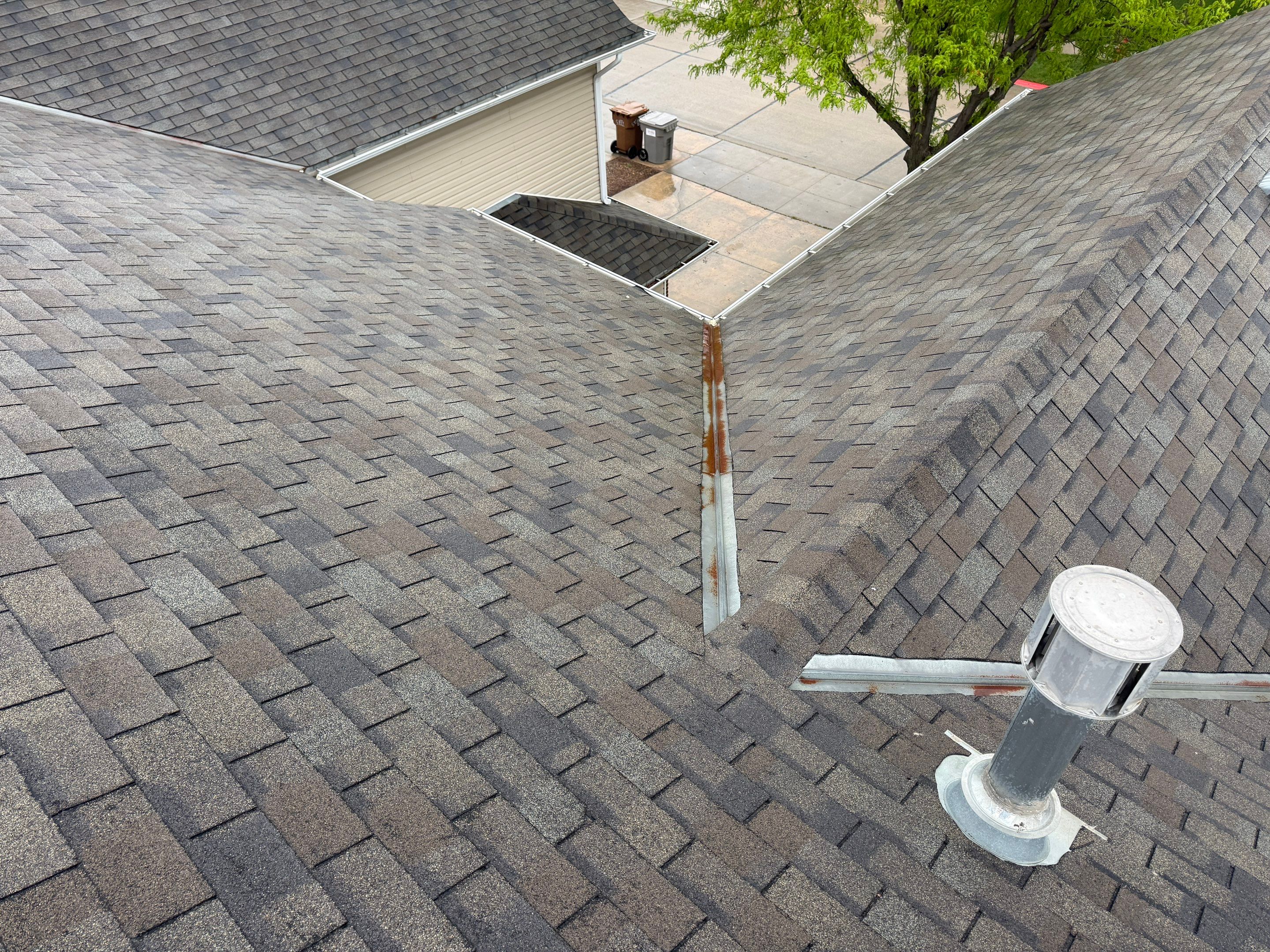 Residential Architectural Shingle Roof Replacement and Gutter Upgrade in Lincoln by Star Home