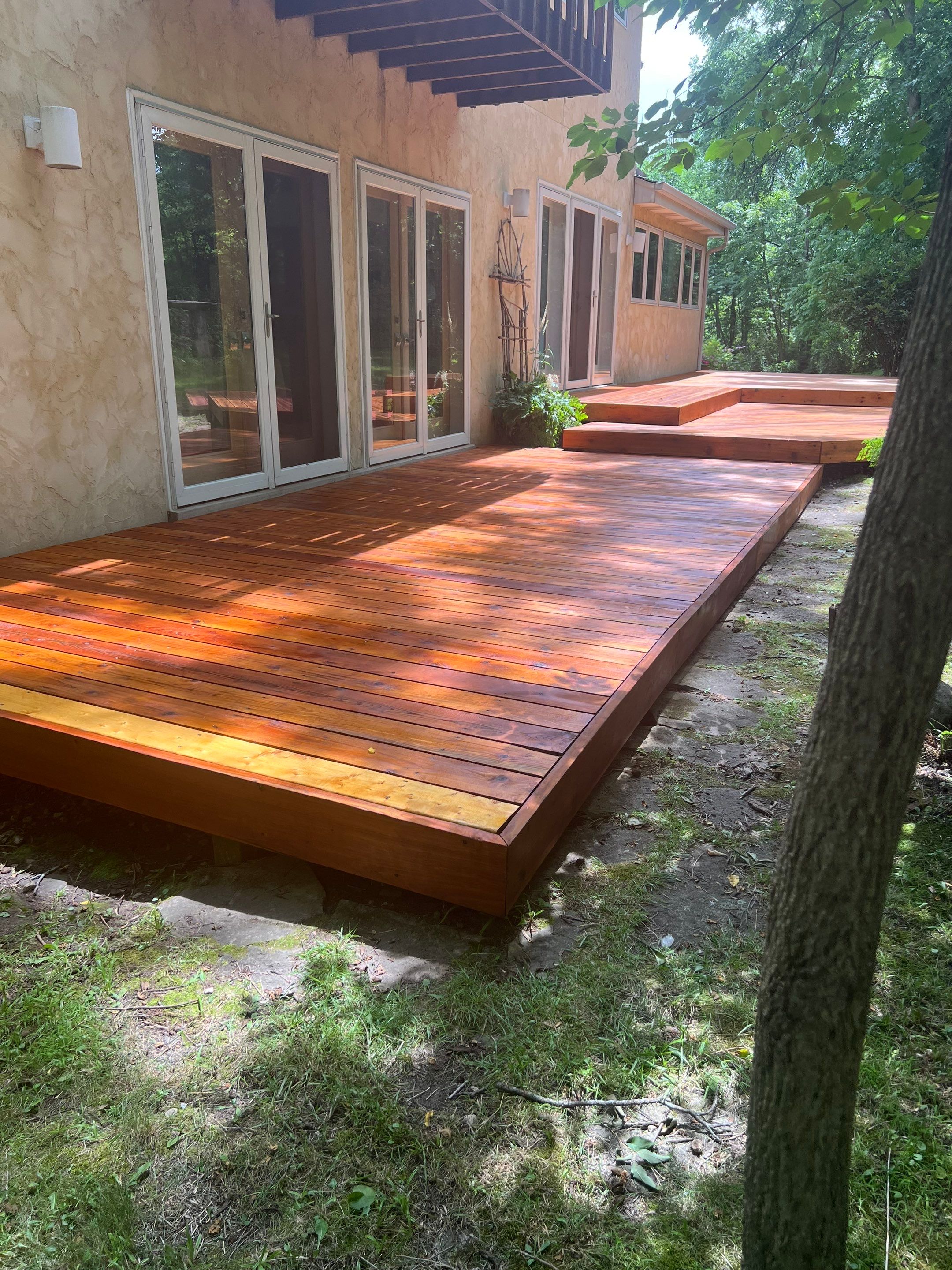 Multi-Level Wood Deck Restoration and Refinishing in Muskego by OCS Contracting Services
