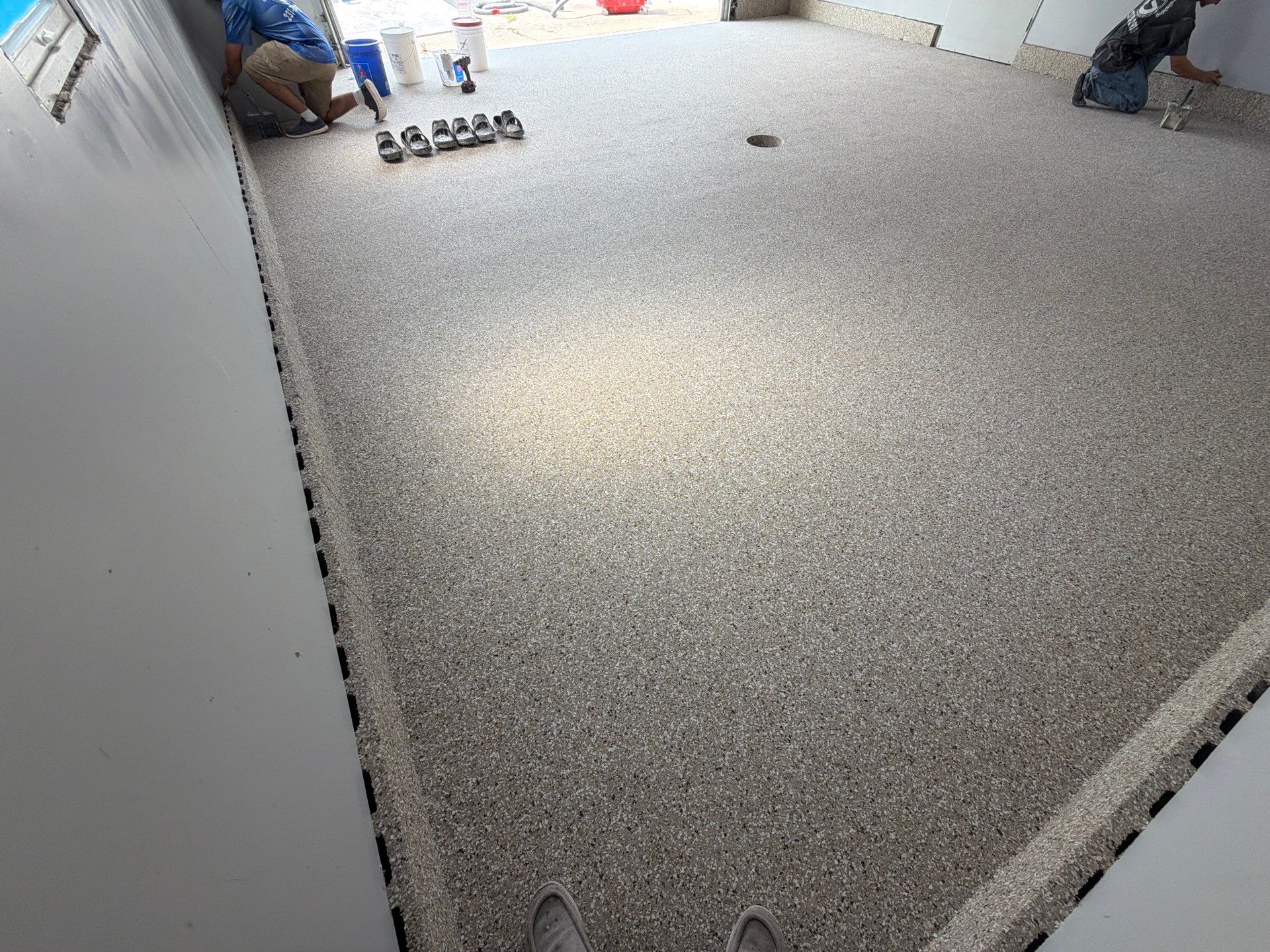 Garage Epoxy Flake Floor Installation and Exterior Siding Repairs in Muskegon by Gordon Painting