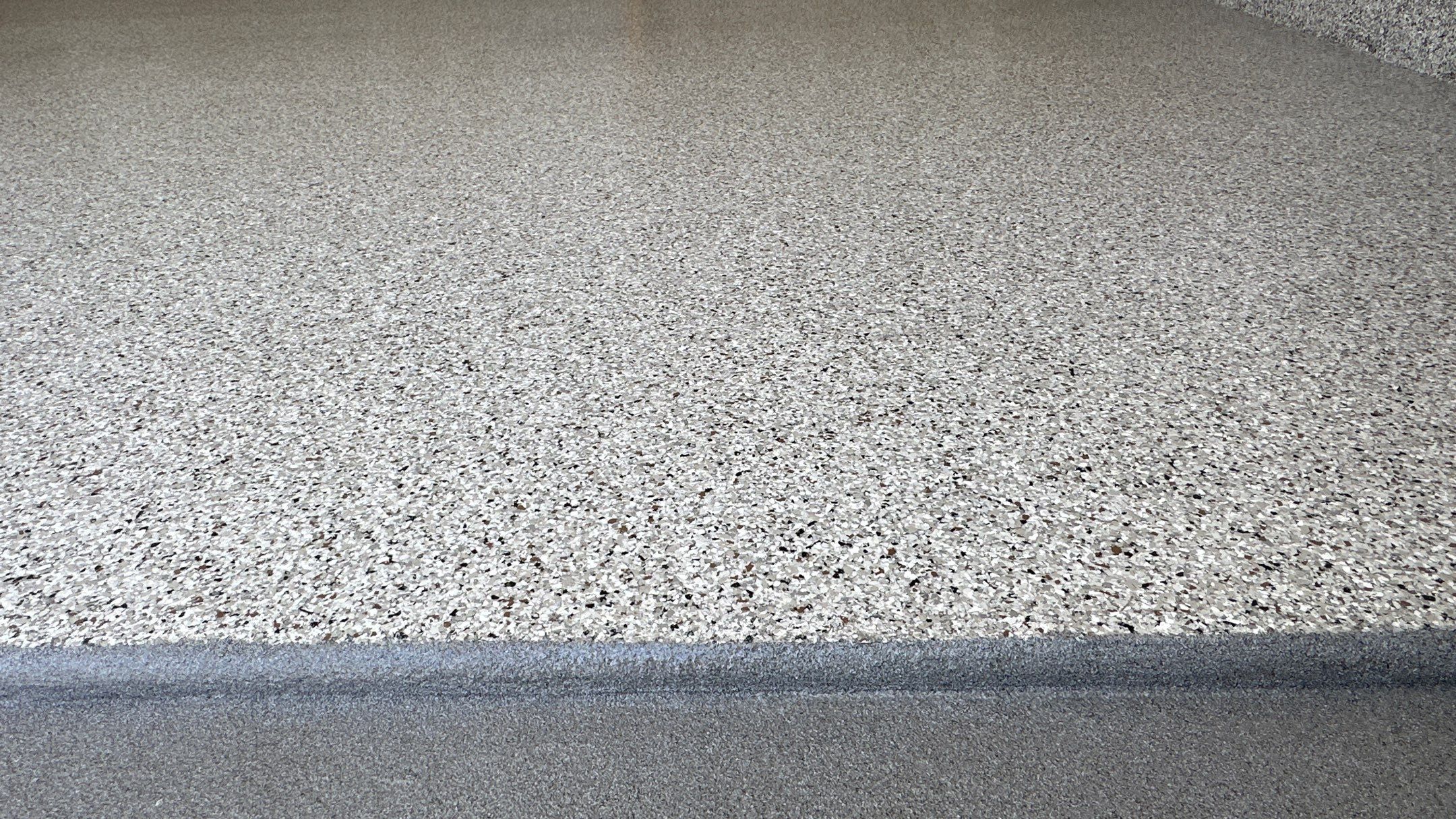 Phil B. new floor with Coyote flake by Banner Garage